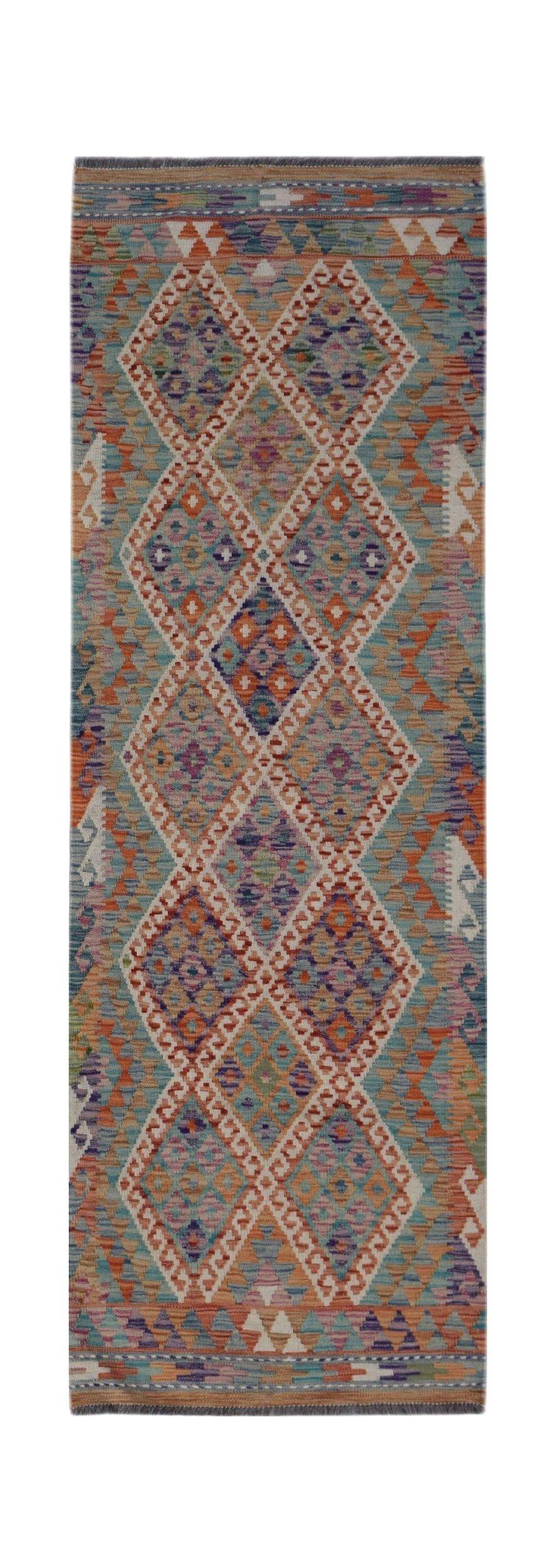 Handwoven Afghan Maimana wool runner featuring a colorful geometric diamond pattern.