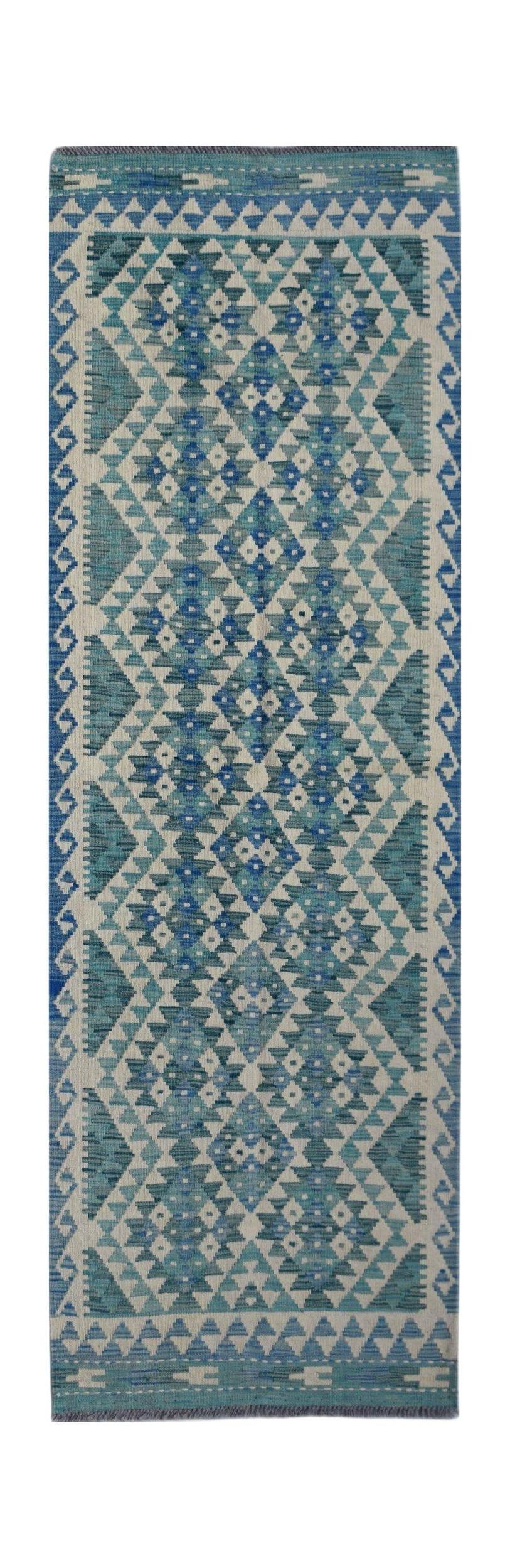 Handwoven Afghan Maimana wool runner featuring a geometric diamond pattern in shades of blue.