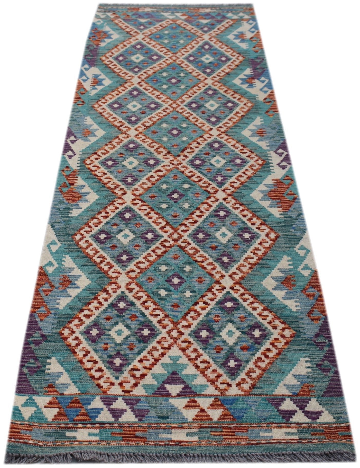 Handwoven Afghan Maimana wool runner rug featuring a geometric diamond pattern in teal and rust.
