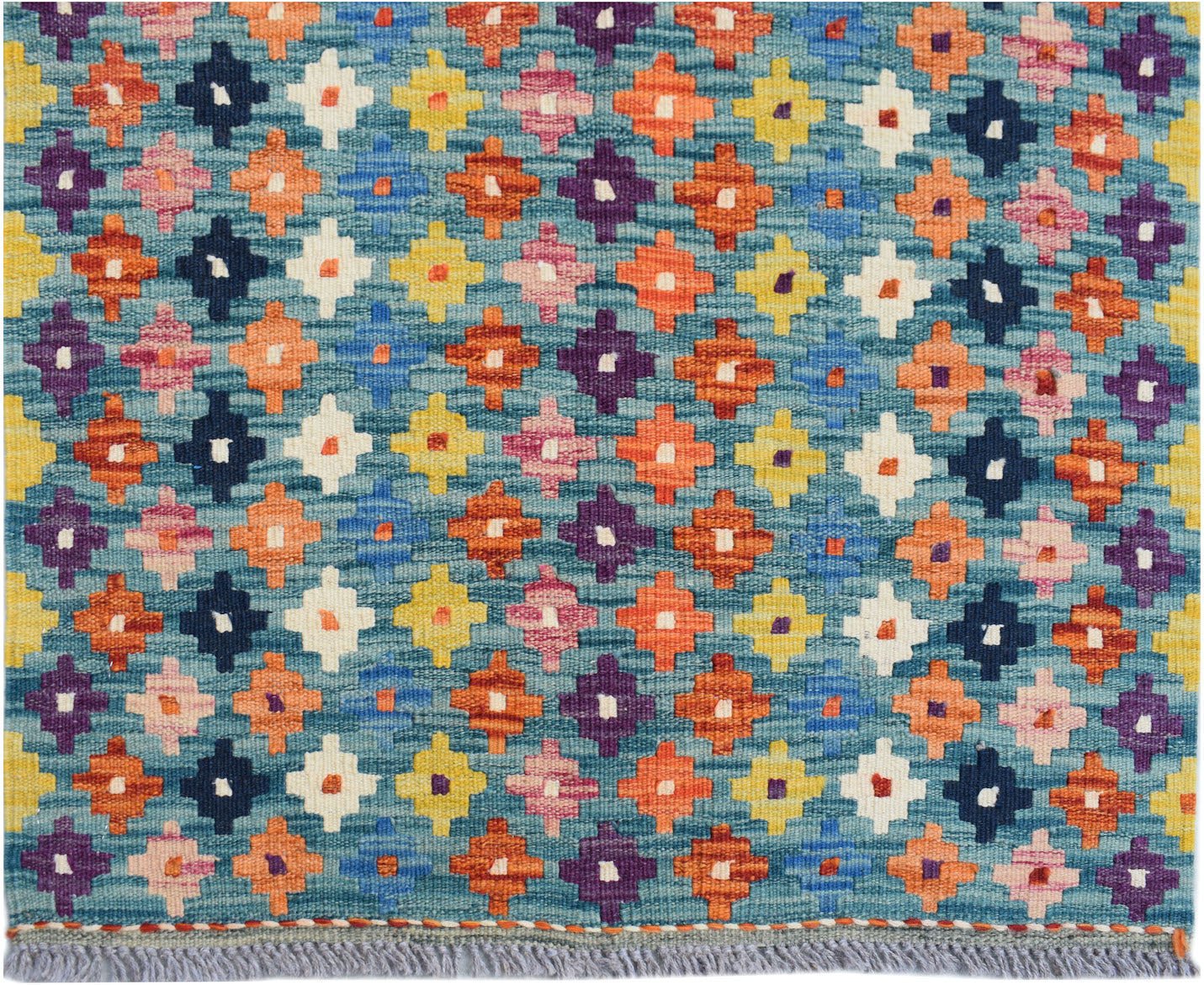 Handwoven Afghan Maimana kilim runner featuring a colorful geometric pattern on a blue background.