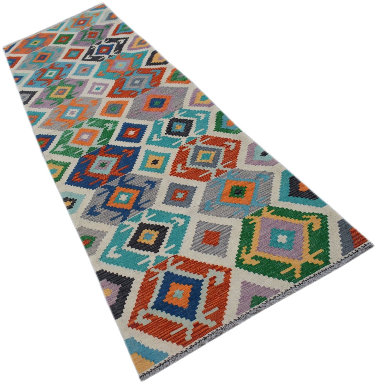 Handwoven Afghan Maimana wool runner rug featuring a colorful geometric diamond pattern.