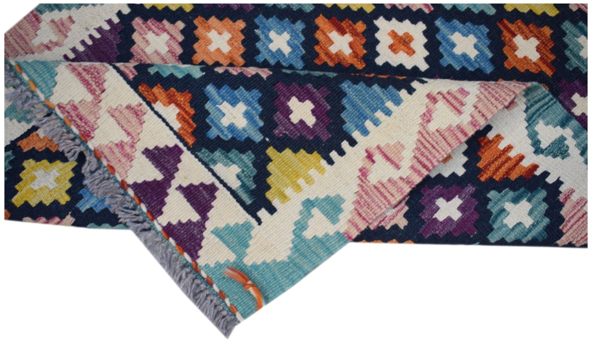 Handwoven Afghan Maimana wool kilim runner featuring a colorful geometric pattern.