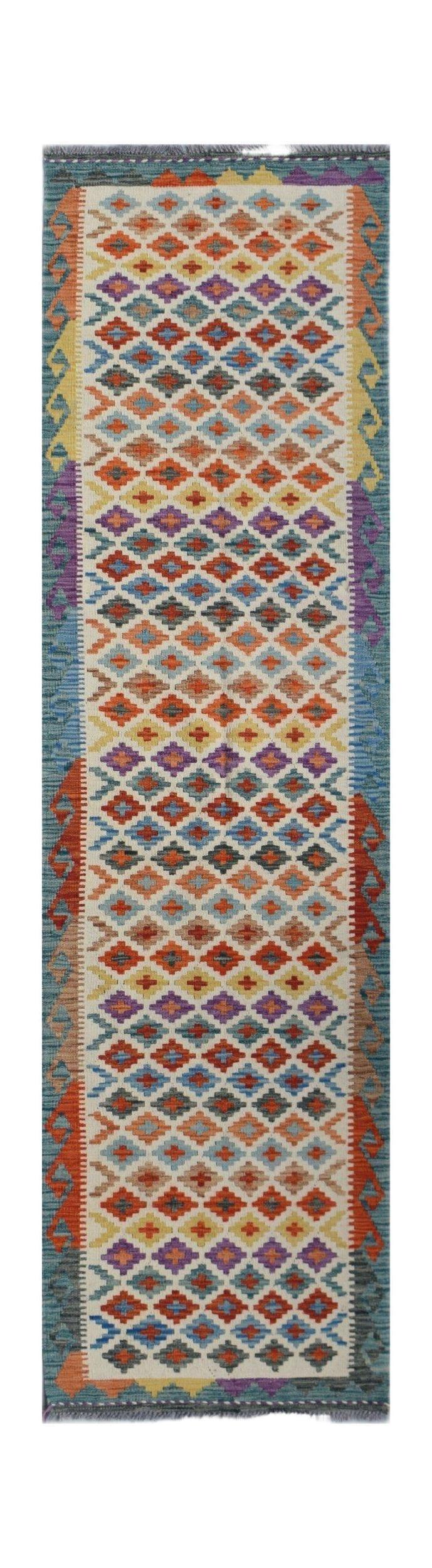 Handwoven Afghan Maimana wool runner rug featuring a colorful geometric diamond pattern.