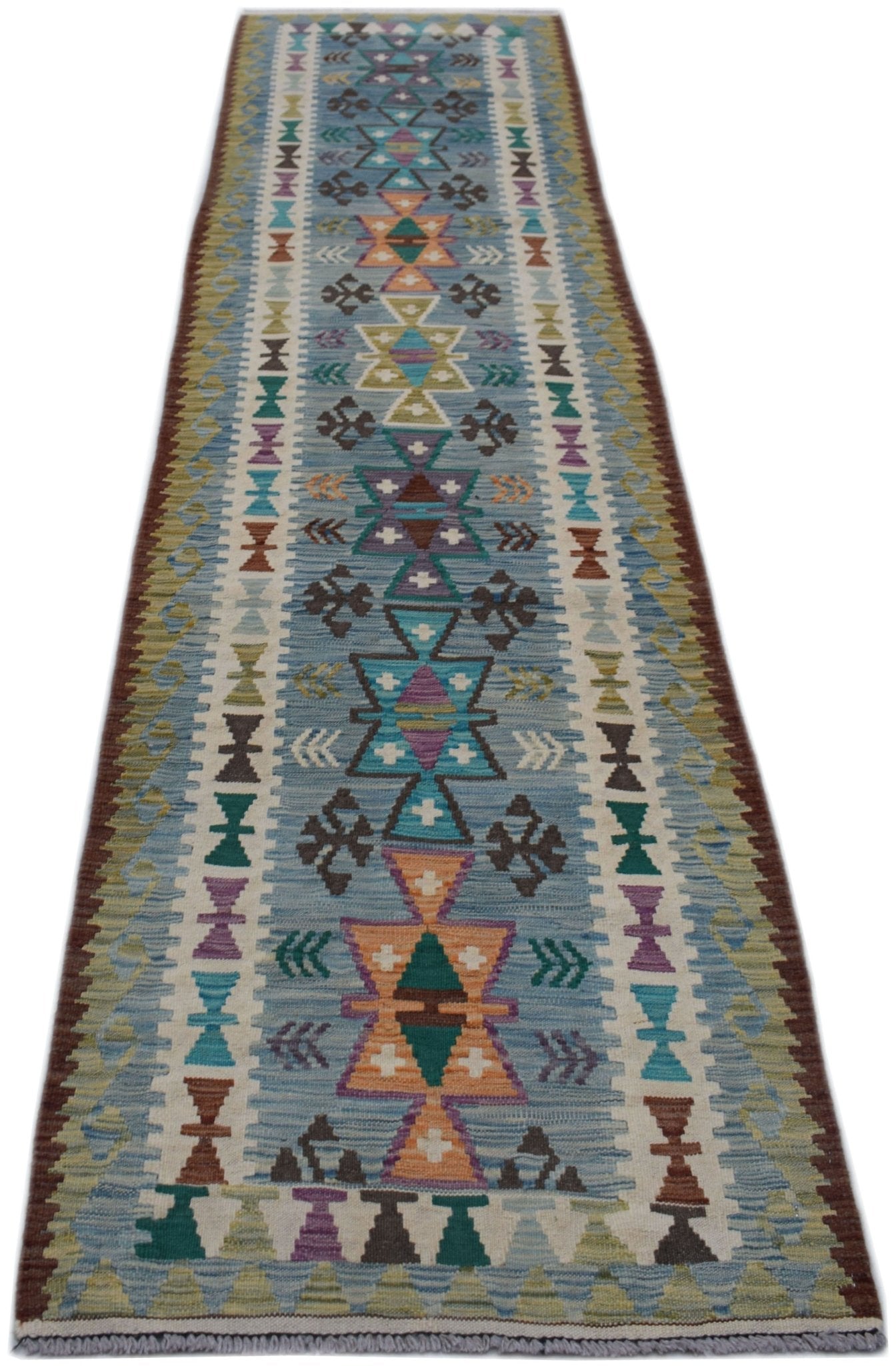 Handwoven Afghan Maimana wool runner rug featuring a blue background with geometric patterns.