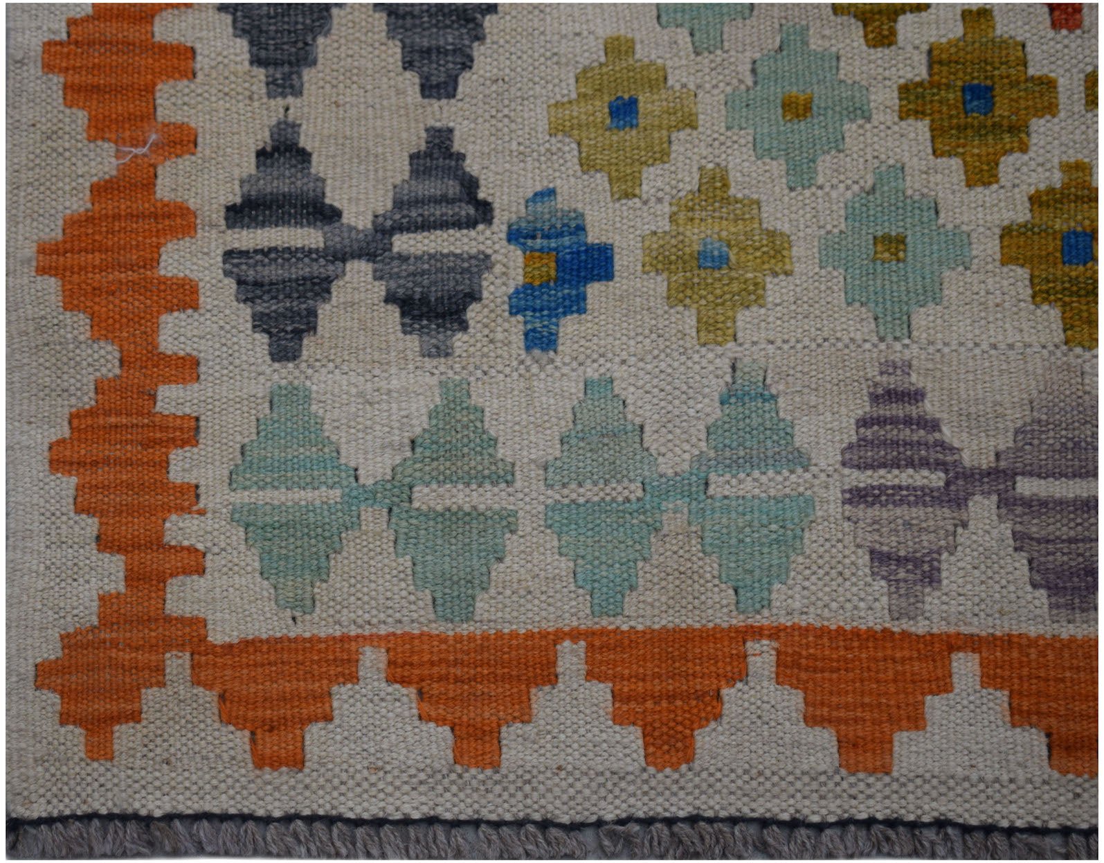 Handwoven Afghan Maimana kilim runner featuring a geometric pattern in orange, blue, and grey.