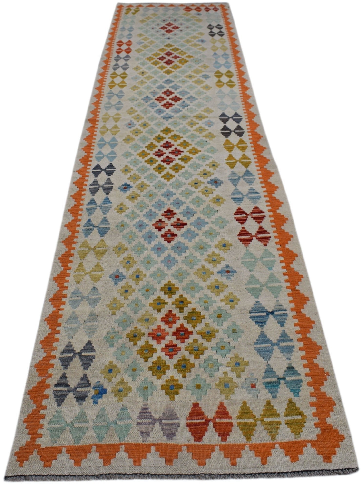 Handwoven Afghan Maimana wool runner featuring a colorful geometric diamond pattern.