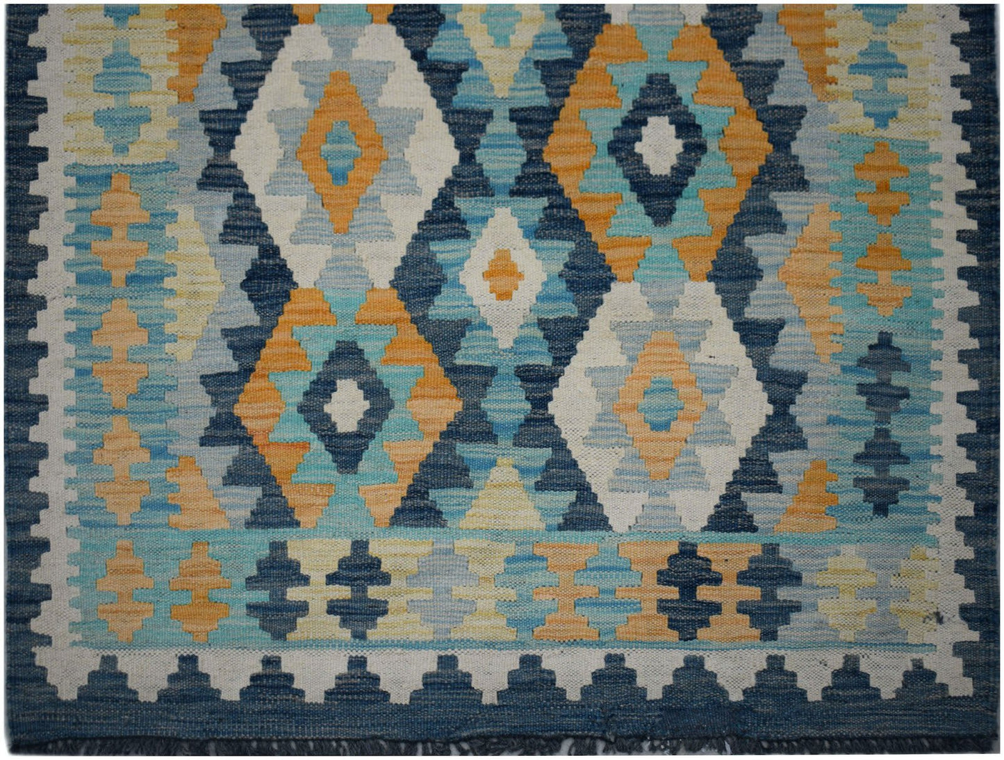 Handwoven Afghan Maimana kilim runner featuring a geometric diamond pattern in blue and orange.