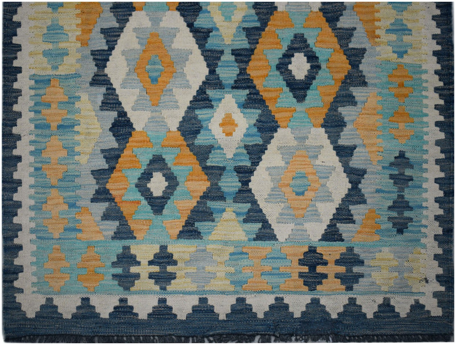 Handwoven Afghan Maimana kilim runner featuring a geometric diamond pattern in blue and orange.