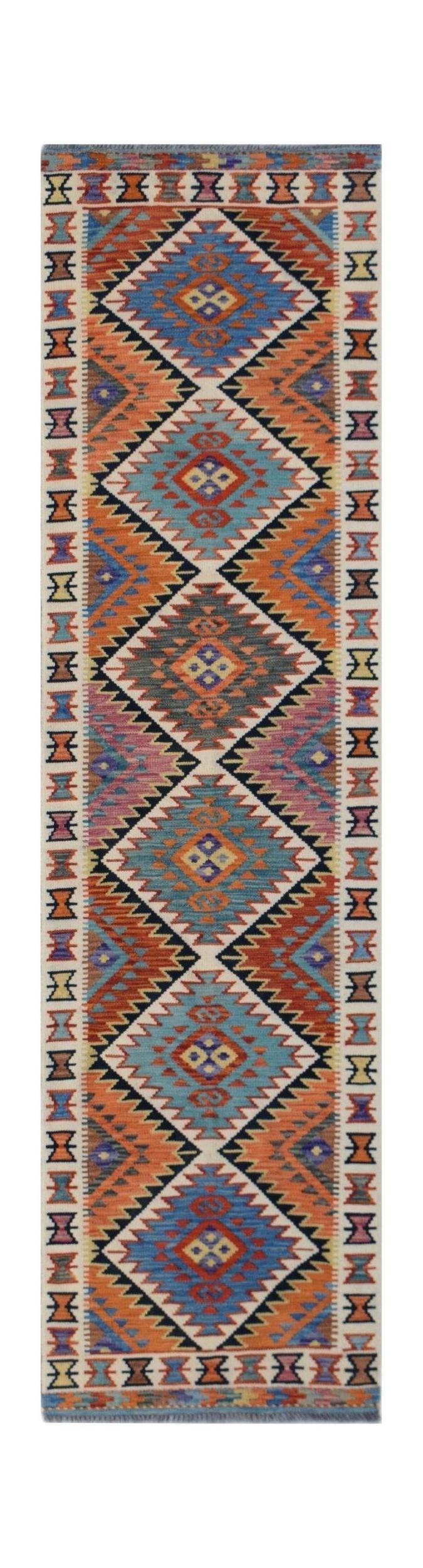 Handwoven Afghan Maimana wool runner rug featuring a colorful geometric diamond pattern.