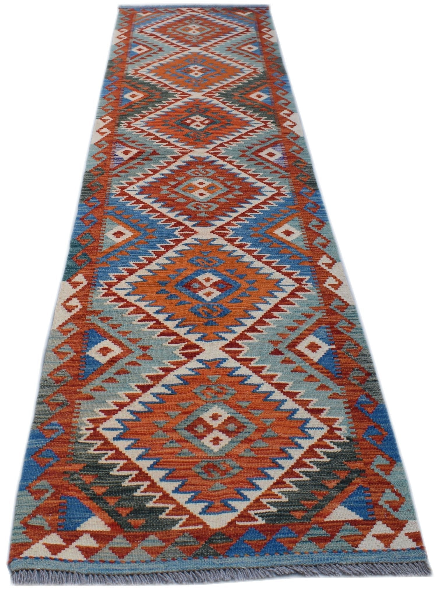 Handwoven Afghan Maimana wool runner rug featuring a vibrant geometric diamond pattern.