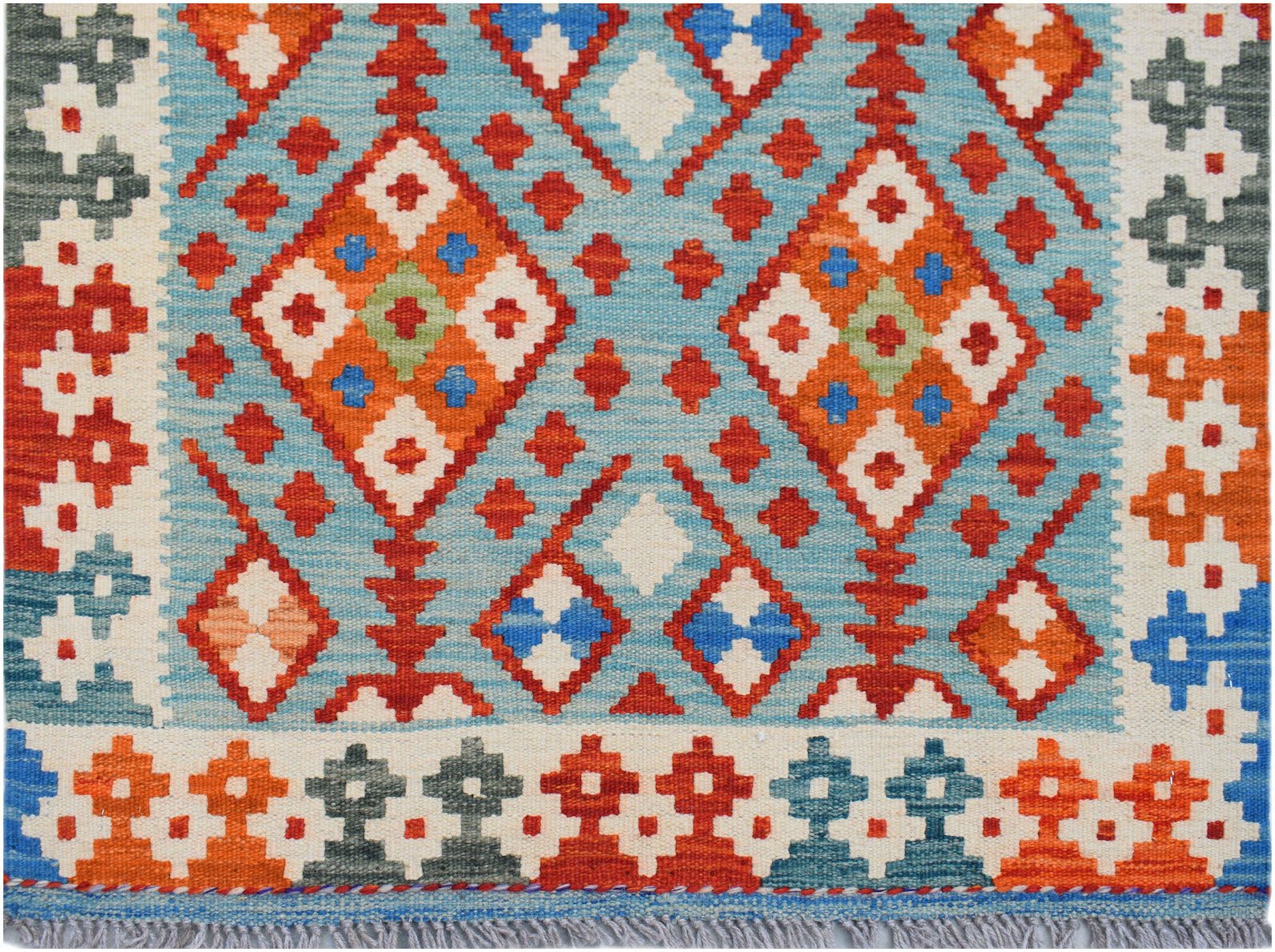 Handwoven Afghan Maimana wool runner featuring a geometric diamond pattern in blue and orange.
