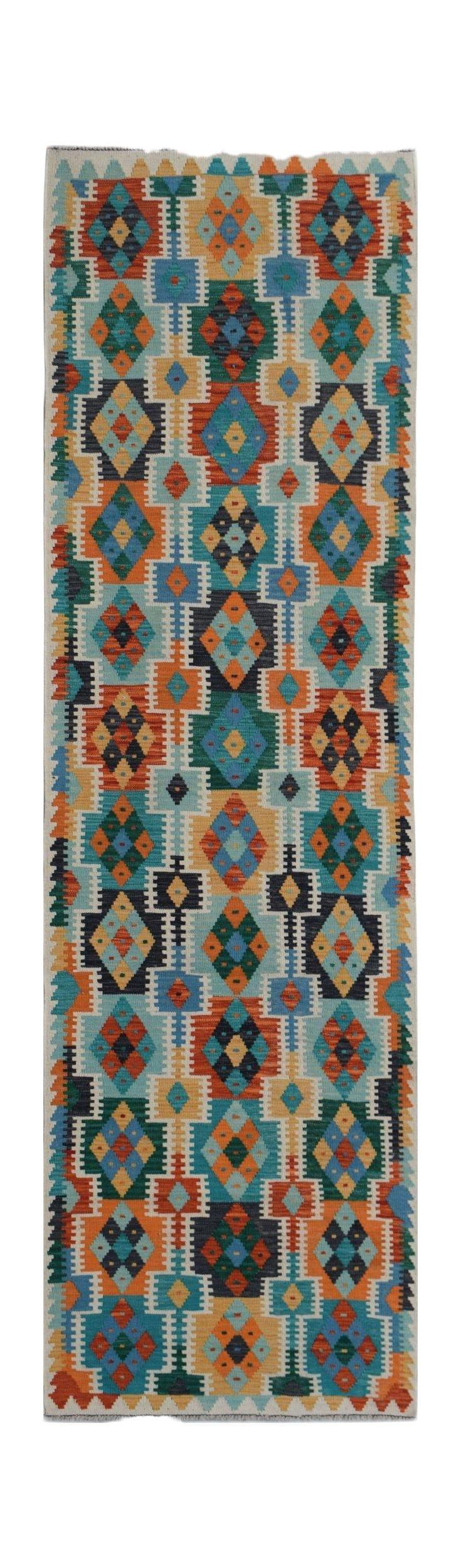 Handwoven Afghan Maimana wool runner rug featuring a colorful geometric diamond pattern.