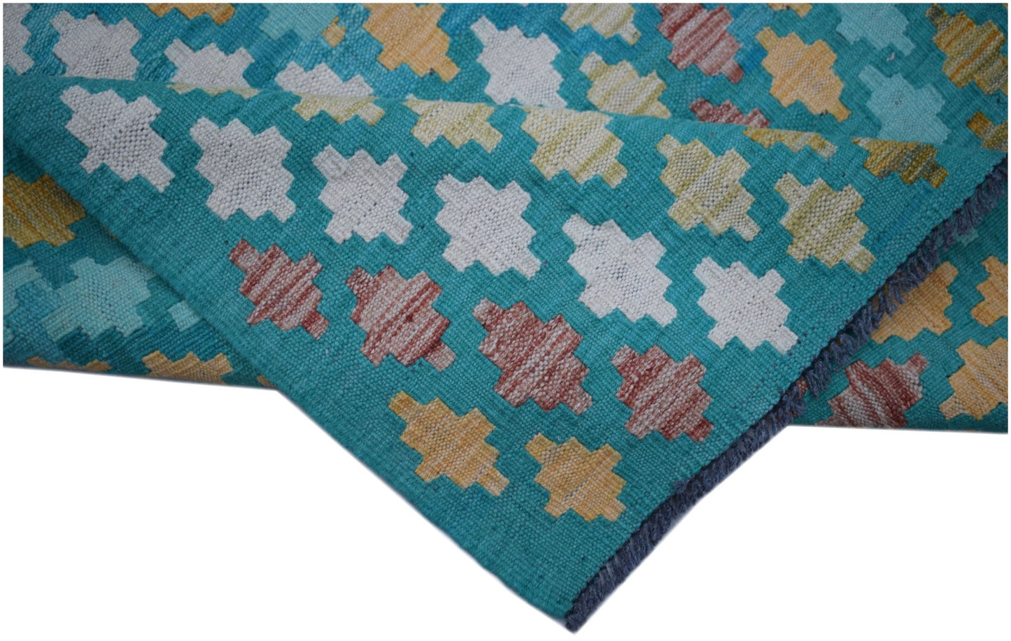 Handwoven Afghan Maimana kilim runner featuring a geometric pattern in teal, white, and gold.