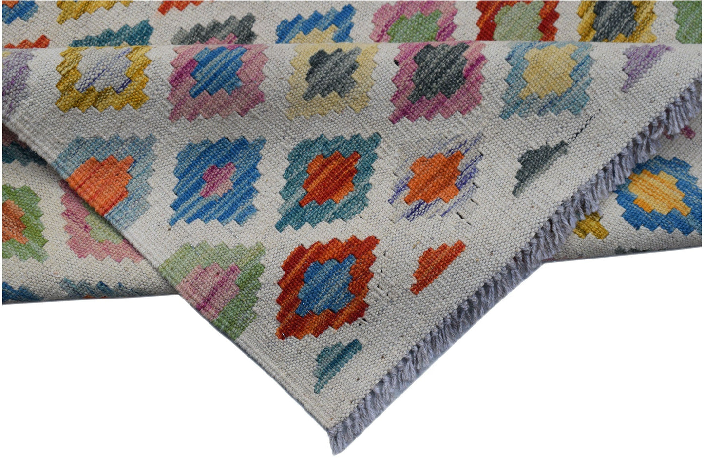 Handwoven Afghan Maimana wool kilim runner featuring a colorful geometric diamond pattern.