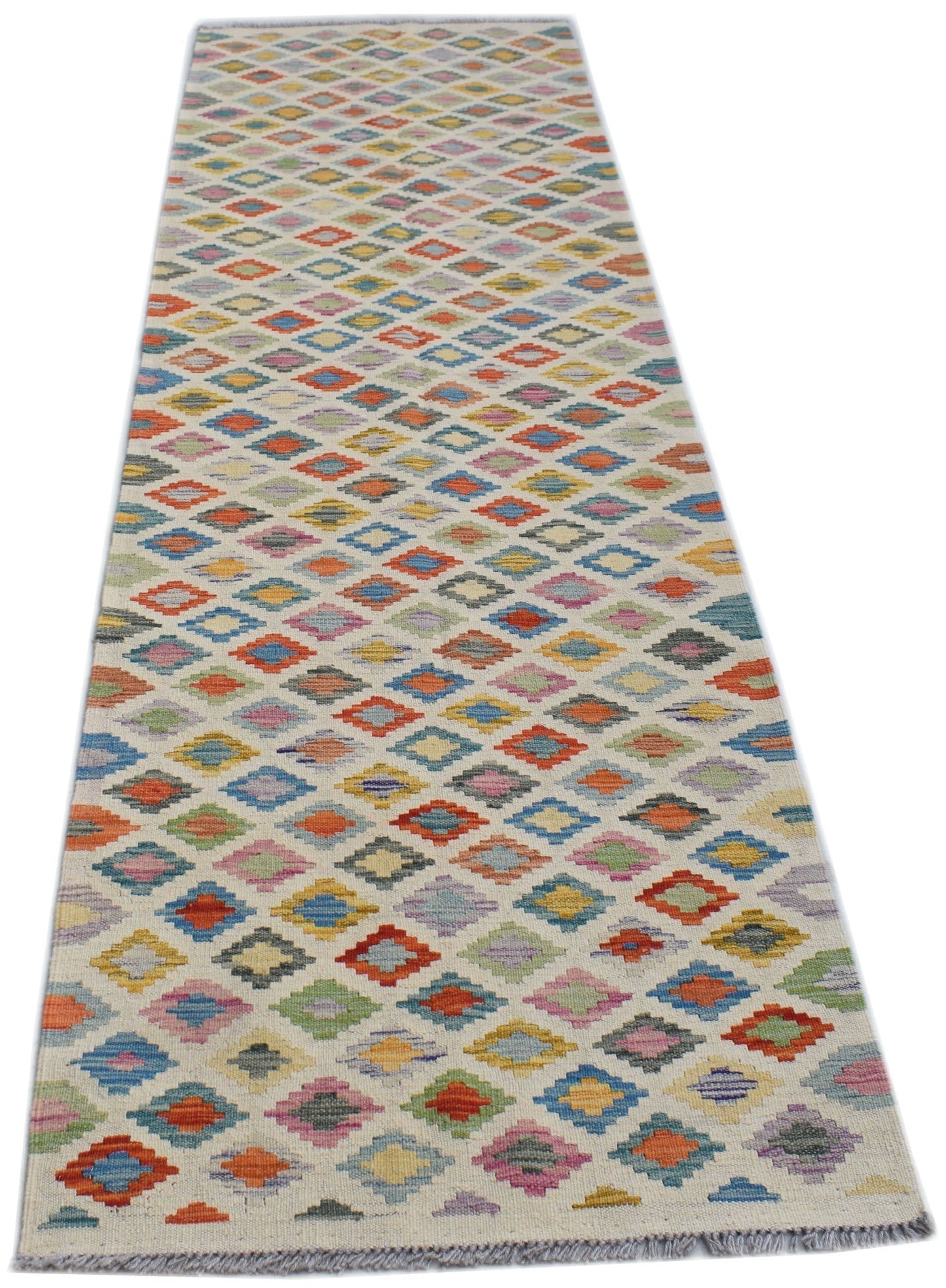 Handwoven Afghan Maimana wool runner rug featuring a colorful geometric diamond pattern.