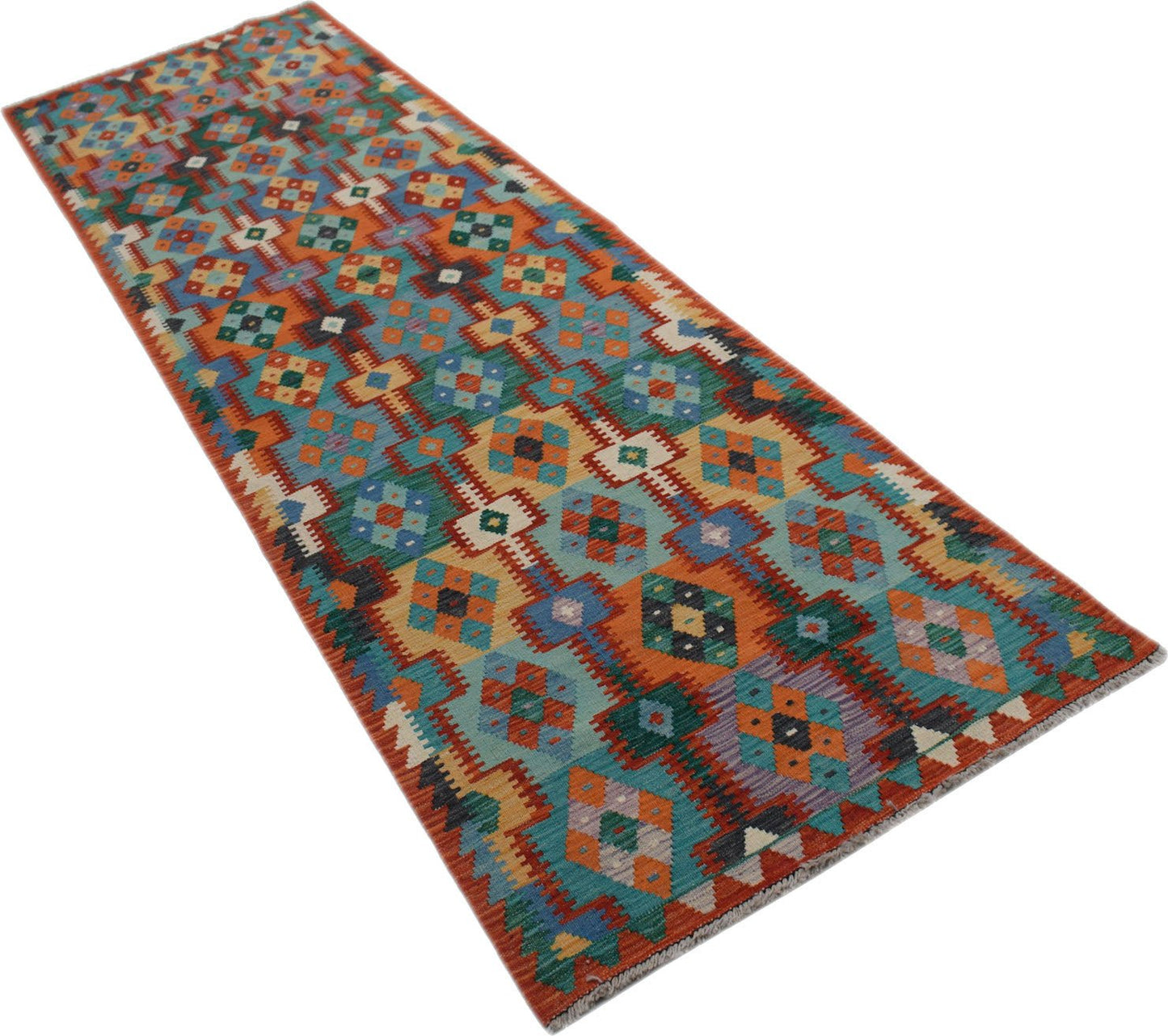Handwoven Afghan Maimana wool runner featuring a colorful geometric pattern on a flatweave texture.