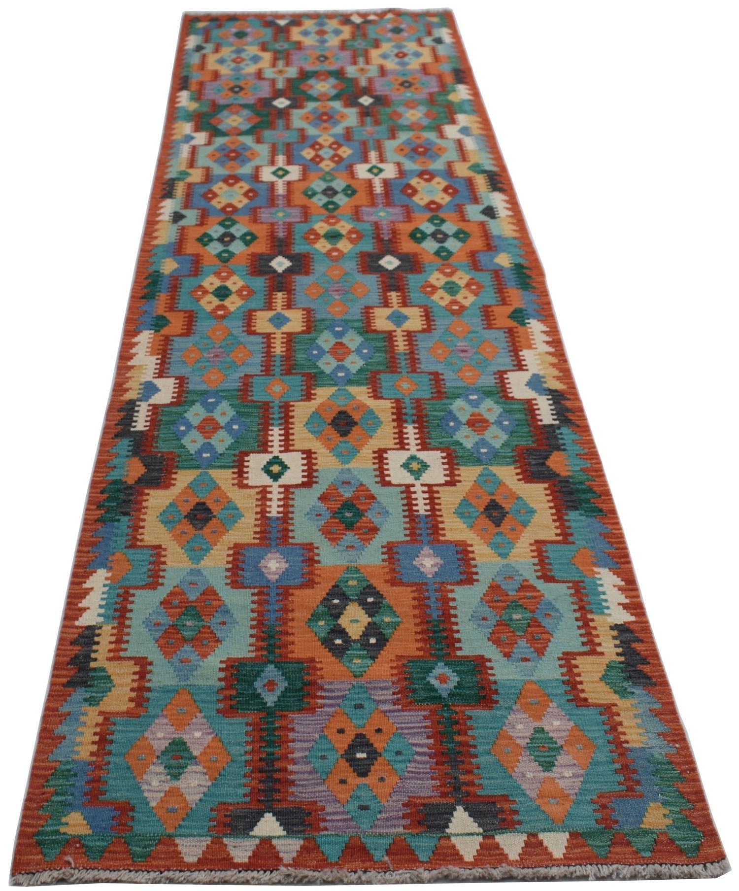 Handwoven Afghan Maimana wool runner rug featuring a colorful geometric pattern.