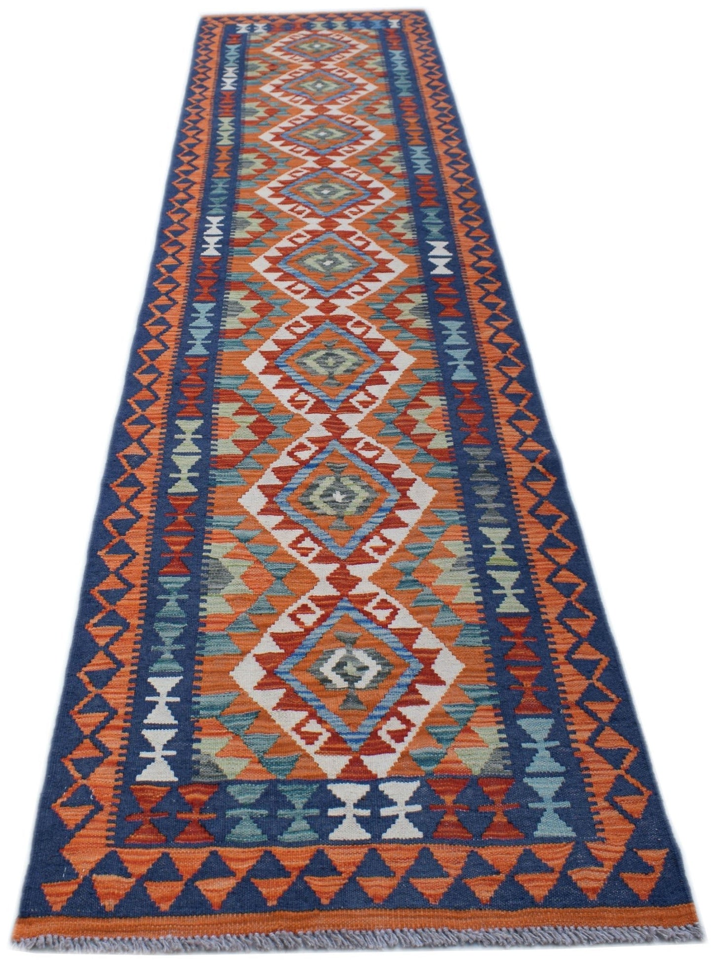 Handwoven Afghan Maimana wool runner rug featuring a geometric diamond pattern in vibrant colors.