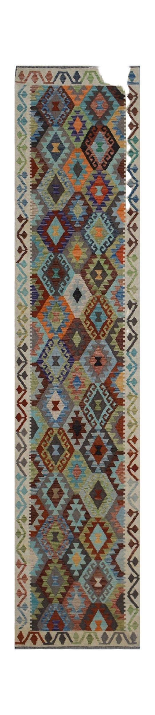 Handwoven Afghan Maimana wool runner rug featuring a colorful geometric diamond pattern.