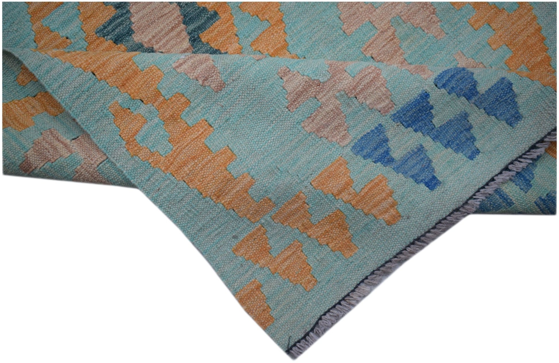 A handmade Afghan Maimana kilim runner featuring a geometric pattern in blue, orange, and beige.