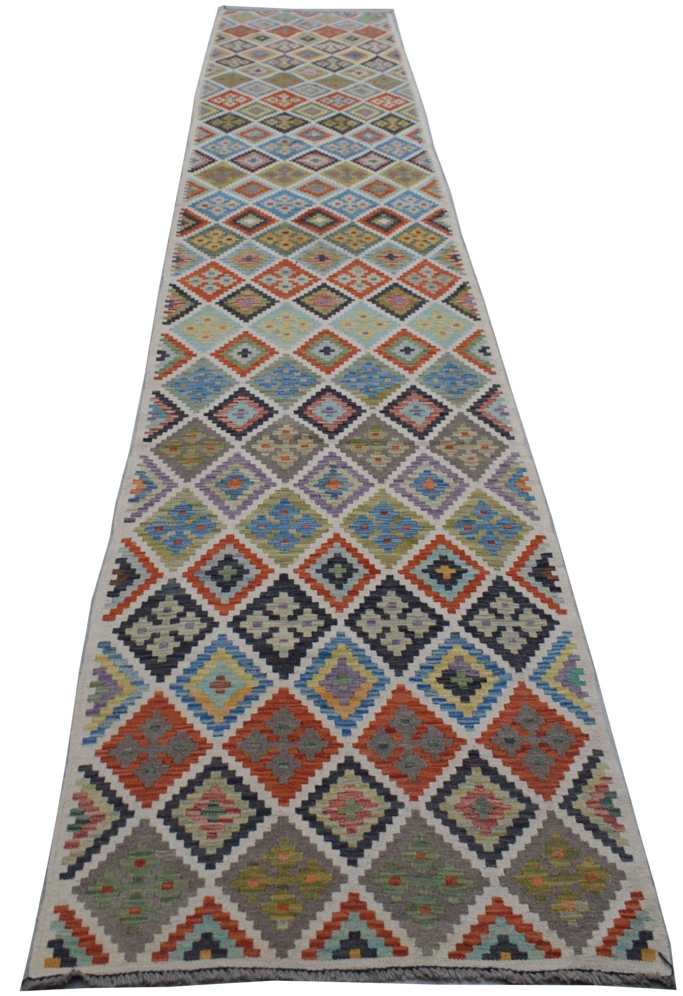 Handwoven Afghan Maimana wool runner rug featuring a colorful geometric diamond pattern.
