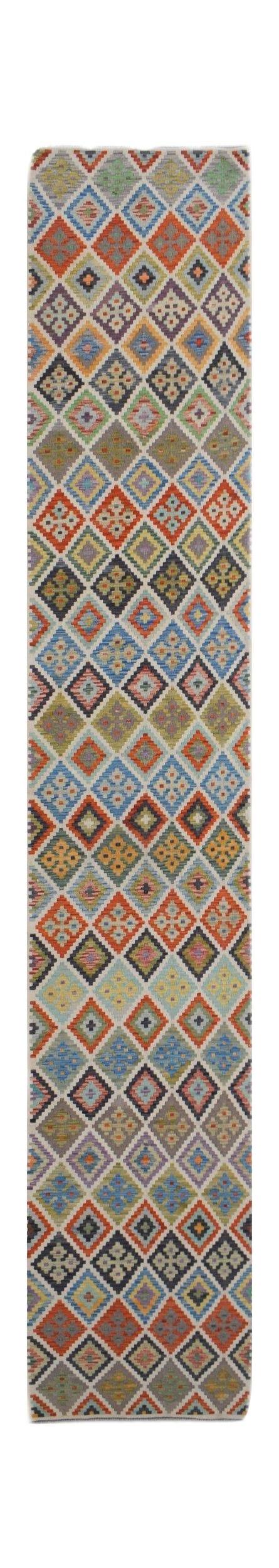 Handwoven Afghan Maimana wool runner rug featuring a colorful geometric diamond pattern.