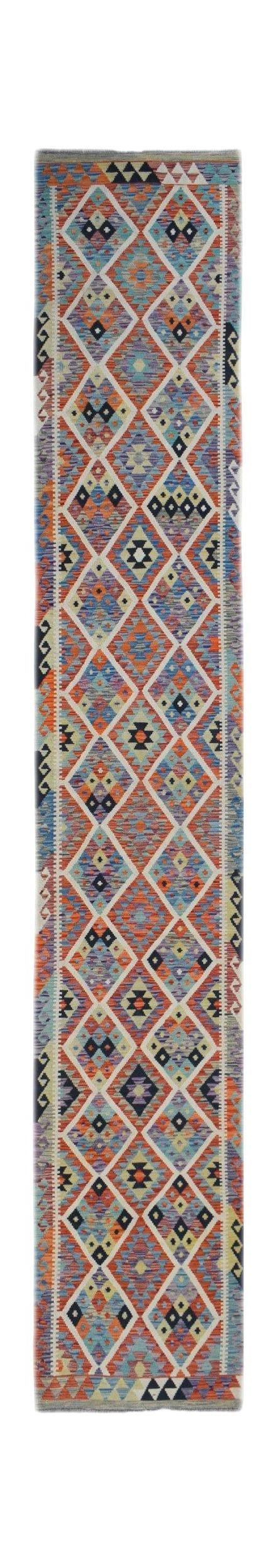 A handmade Afghan Maimana wool runner rug featuring a vibrant, multi-colored geometric diamond pattern.