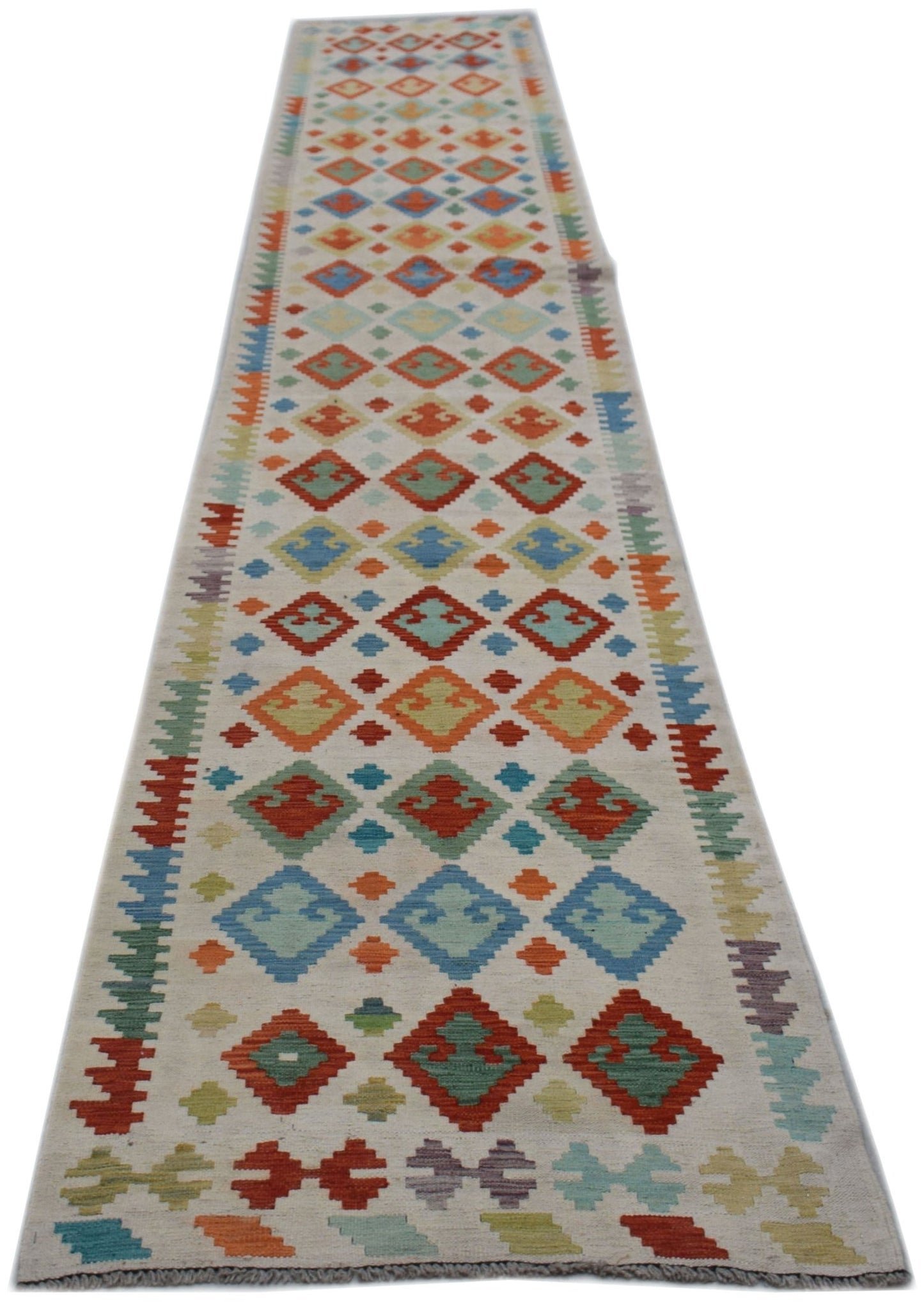 Handwoven Afghan Maimana wool runner featuring a colorful geometric diamond pattern.