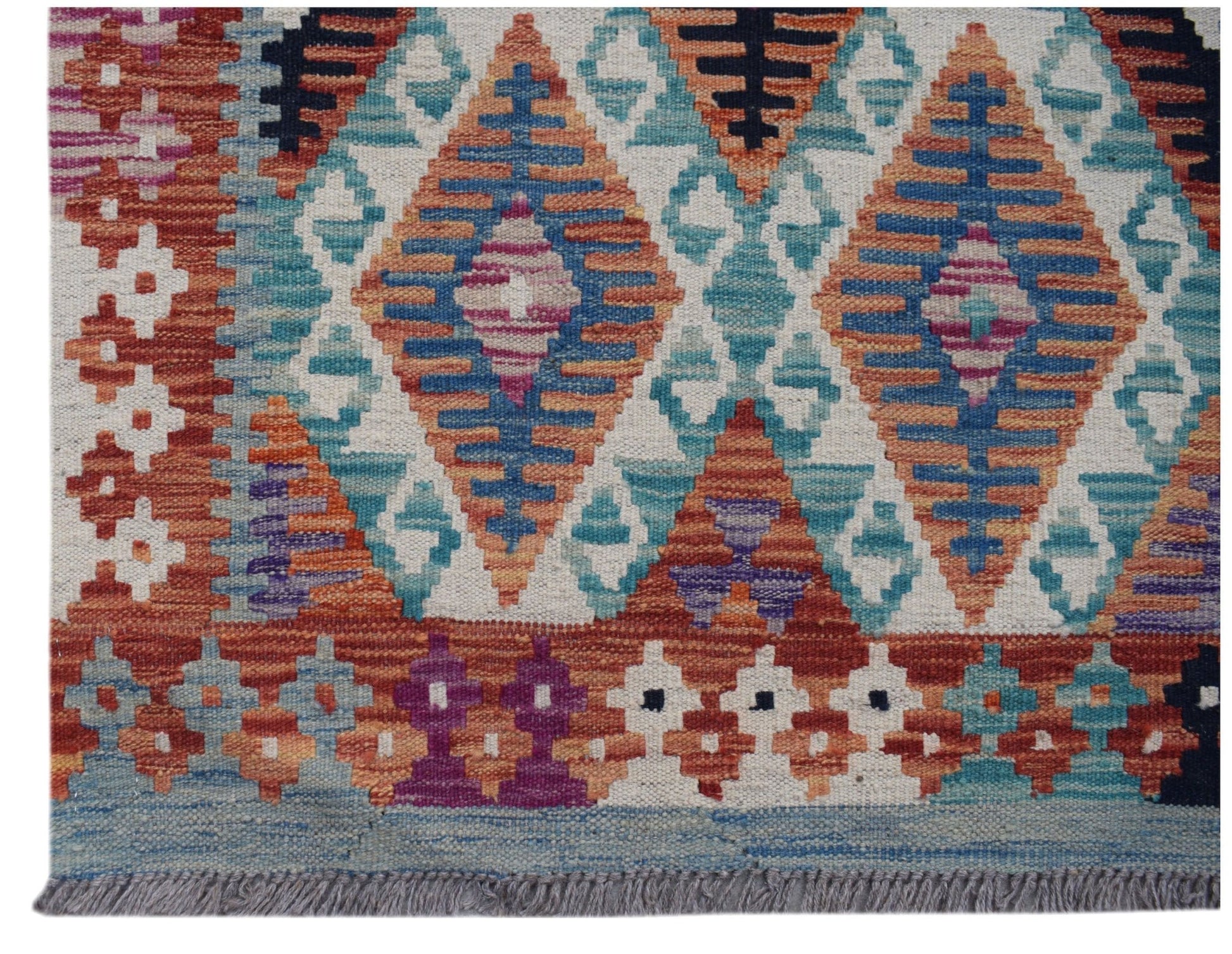 Handwoven Afghan Maimana Kilim runner featuring a geometric diamond pattern in vibrant colors.
