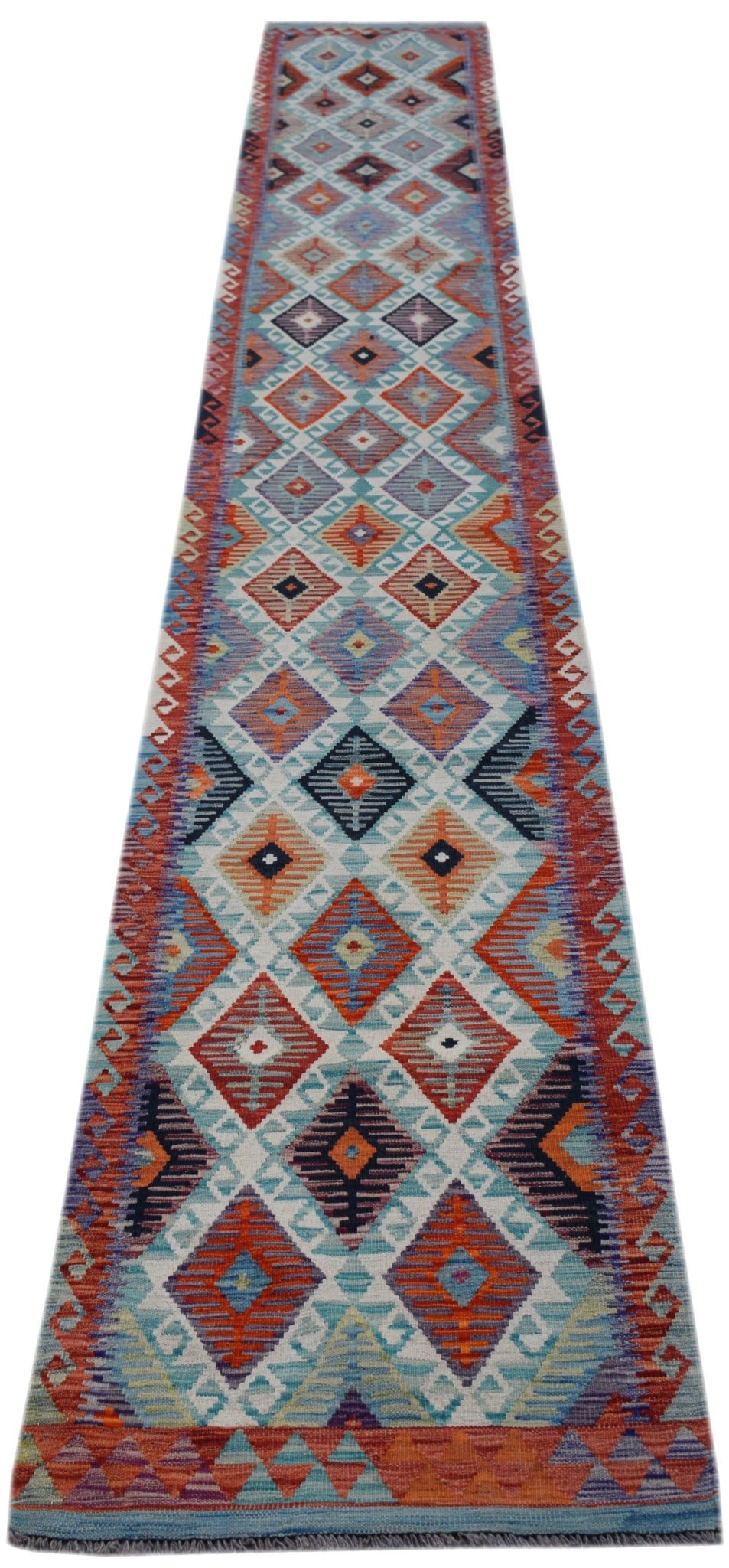 Handwoven Afghan Maimana wool runner featuring a vibrant geometric diamond pattern.
