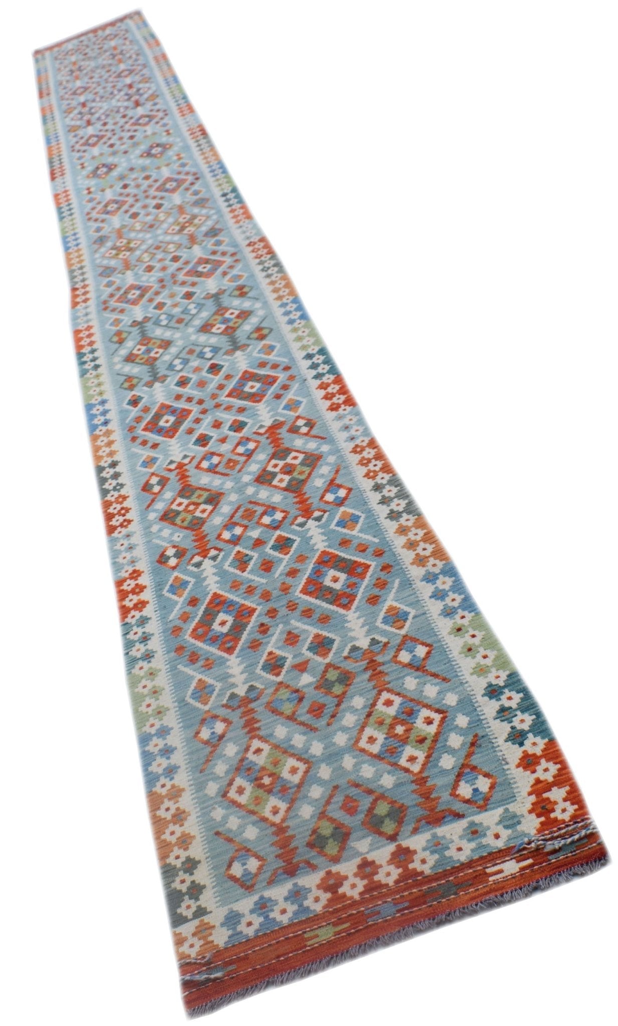 A long, handmade Afghan Maimana kilim runner featuring geometric patterns in blue and orange tones.