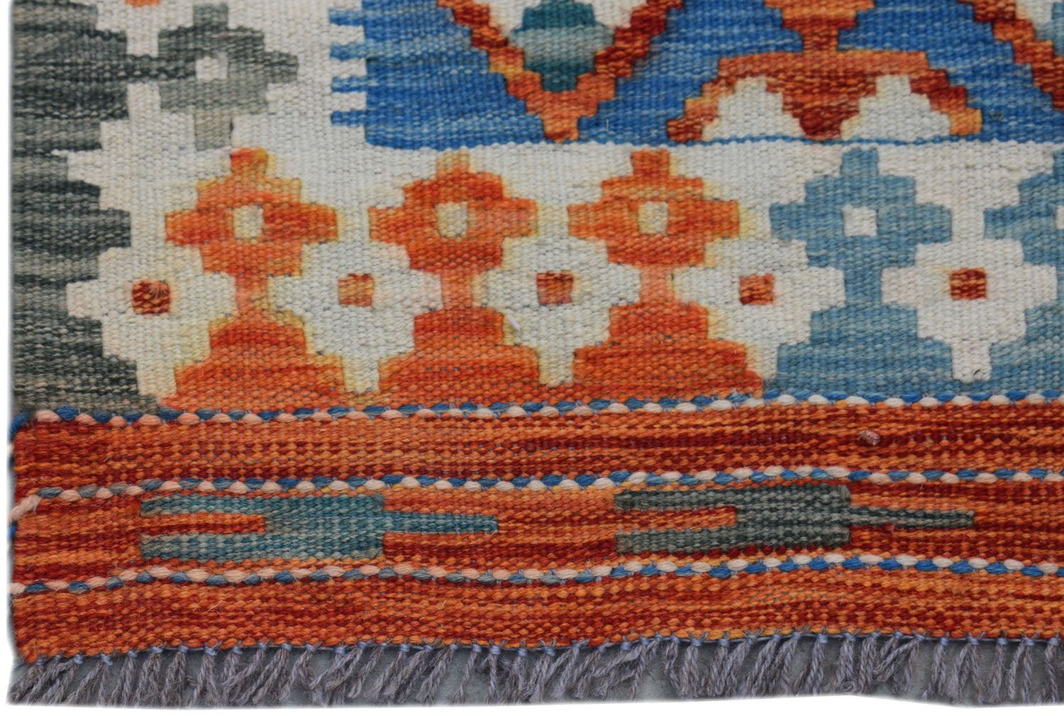 Handwoven Afghan Maimana kilim runner featuring geometric patterns in orange, blue, and grey.