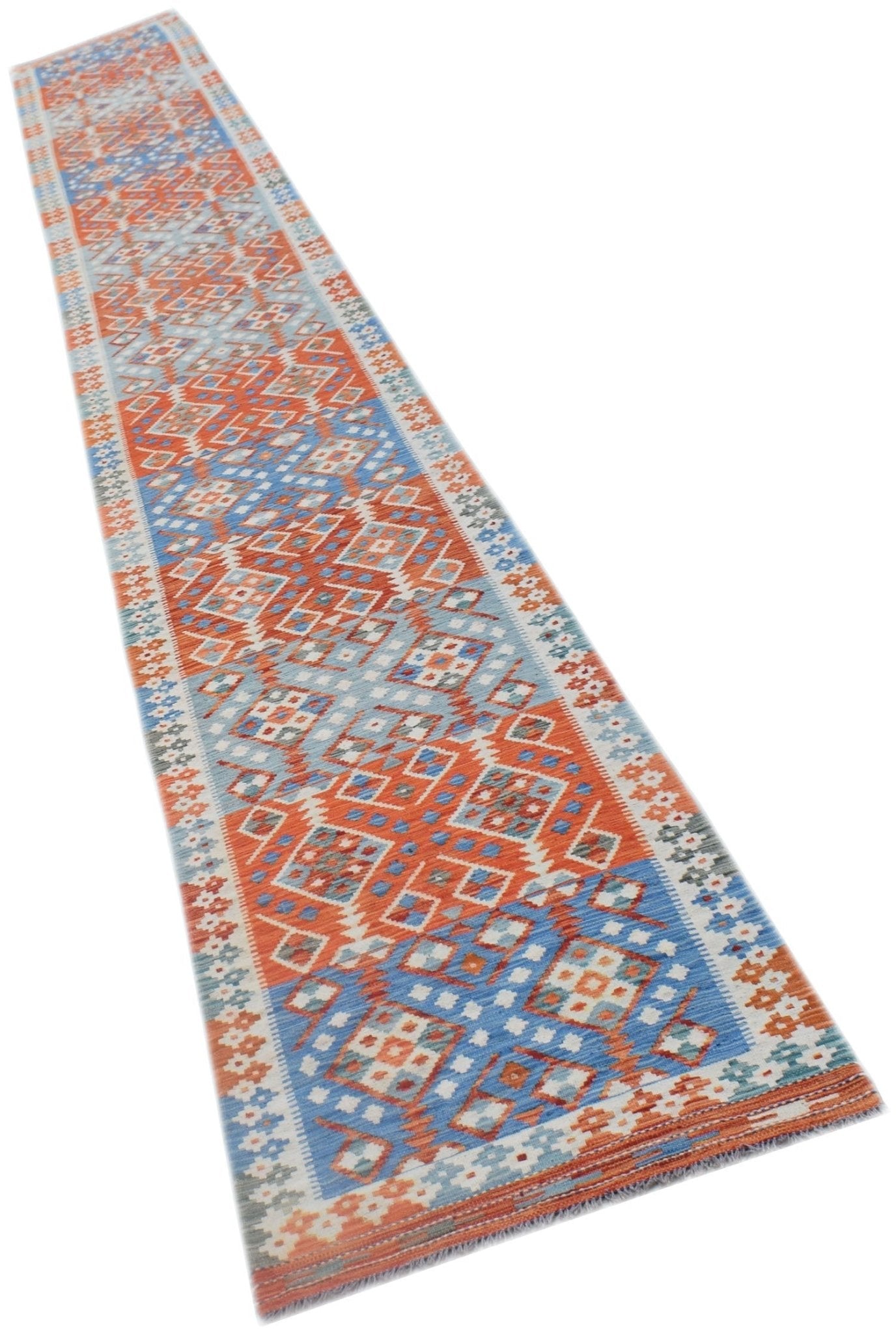 A long, handmade Afghan Maimana kilim runner featuring intricate geometric patterns in blue and orange.