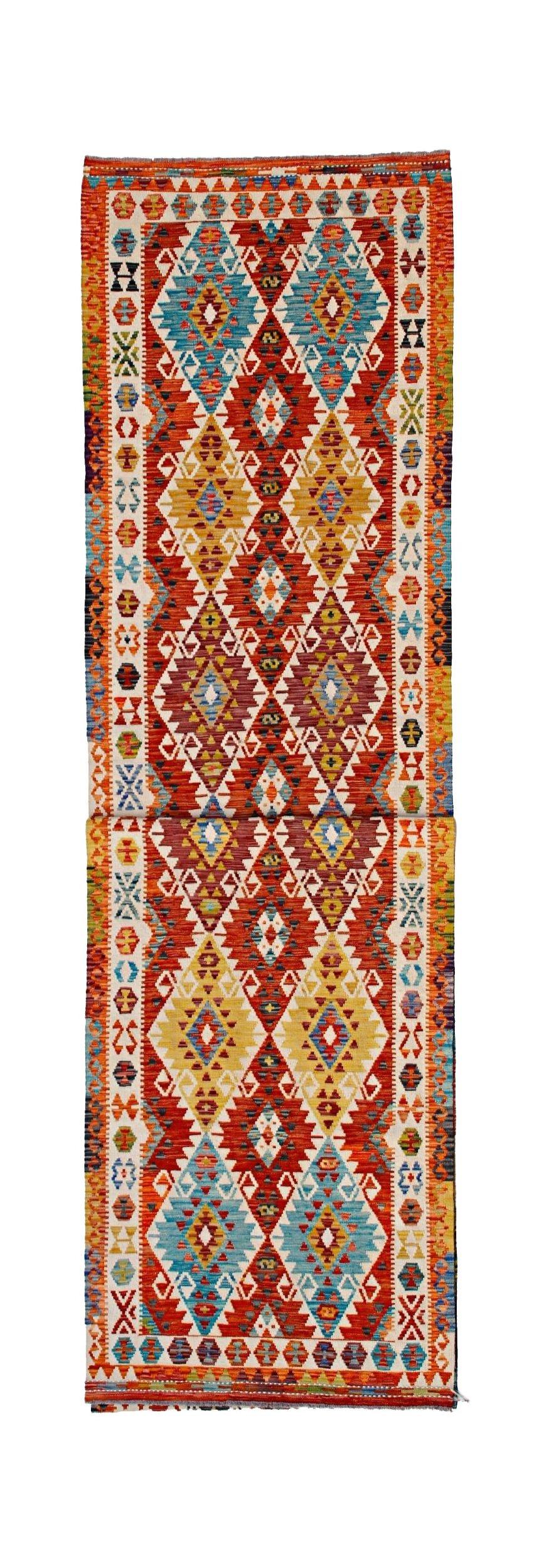 Handwoven Afghan Maimana wool runner featuring a vibrant geometric diamond pattern.