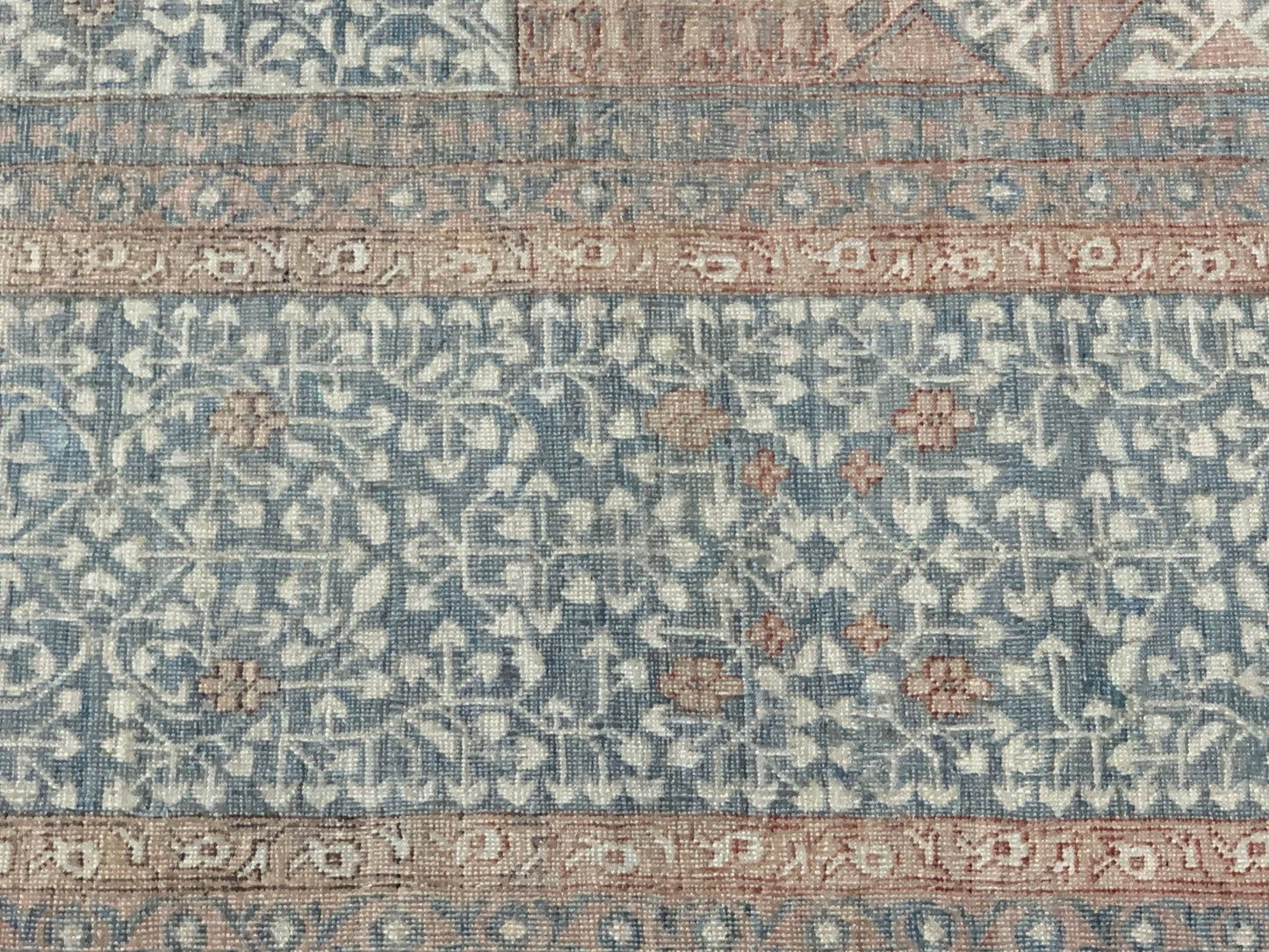 A handmade Afghan Chobi rug featuring a traditional Mamluk pattern in muted blue and tan tones.
