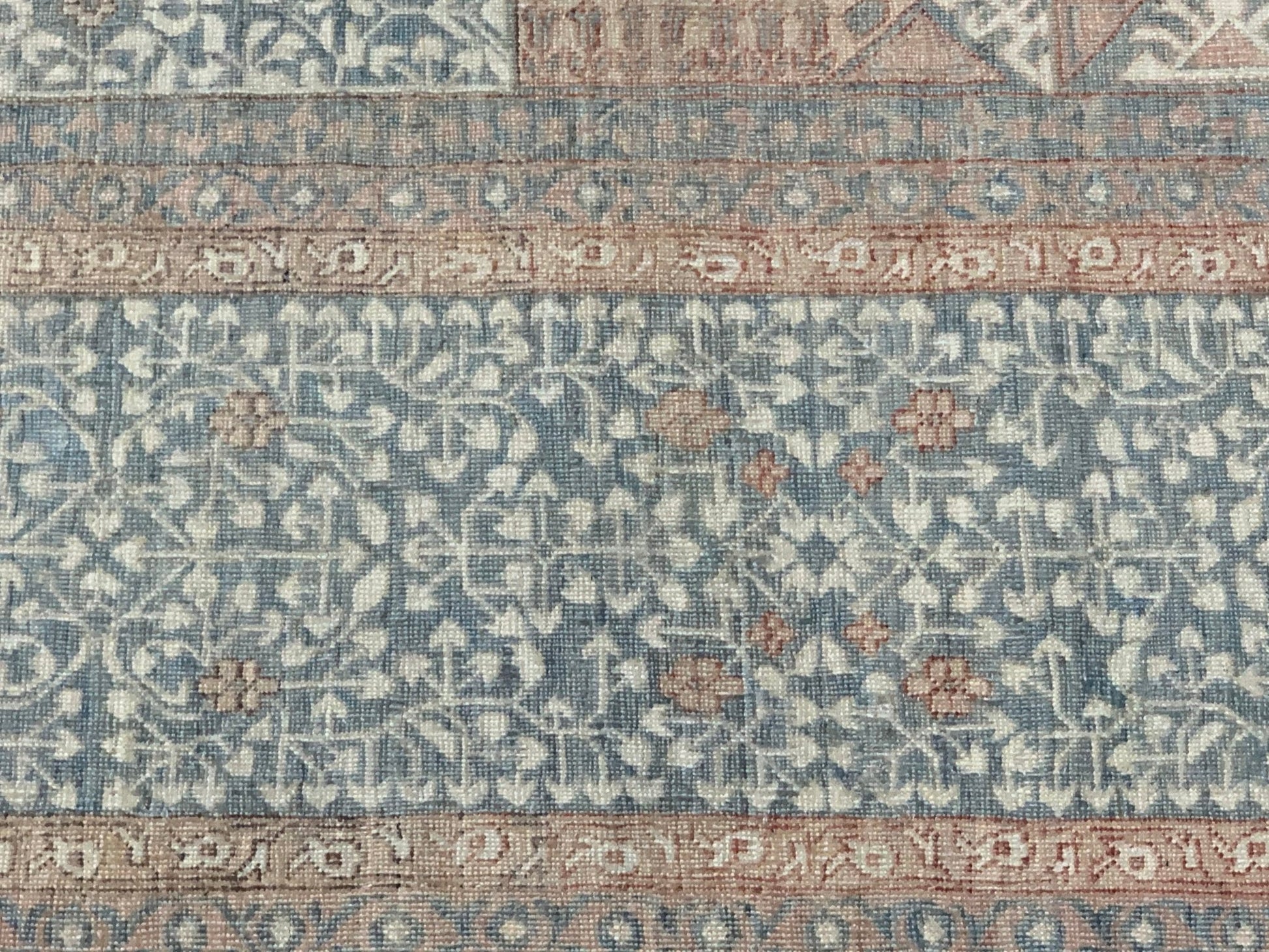 A handmade Afghan Chobi rug featuring a traditional Mamluk pattern in muted blue and tan tones.