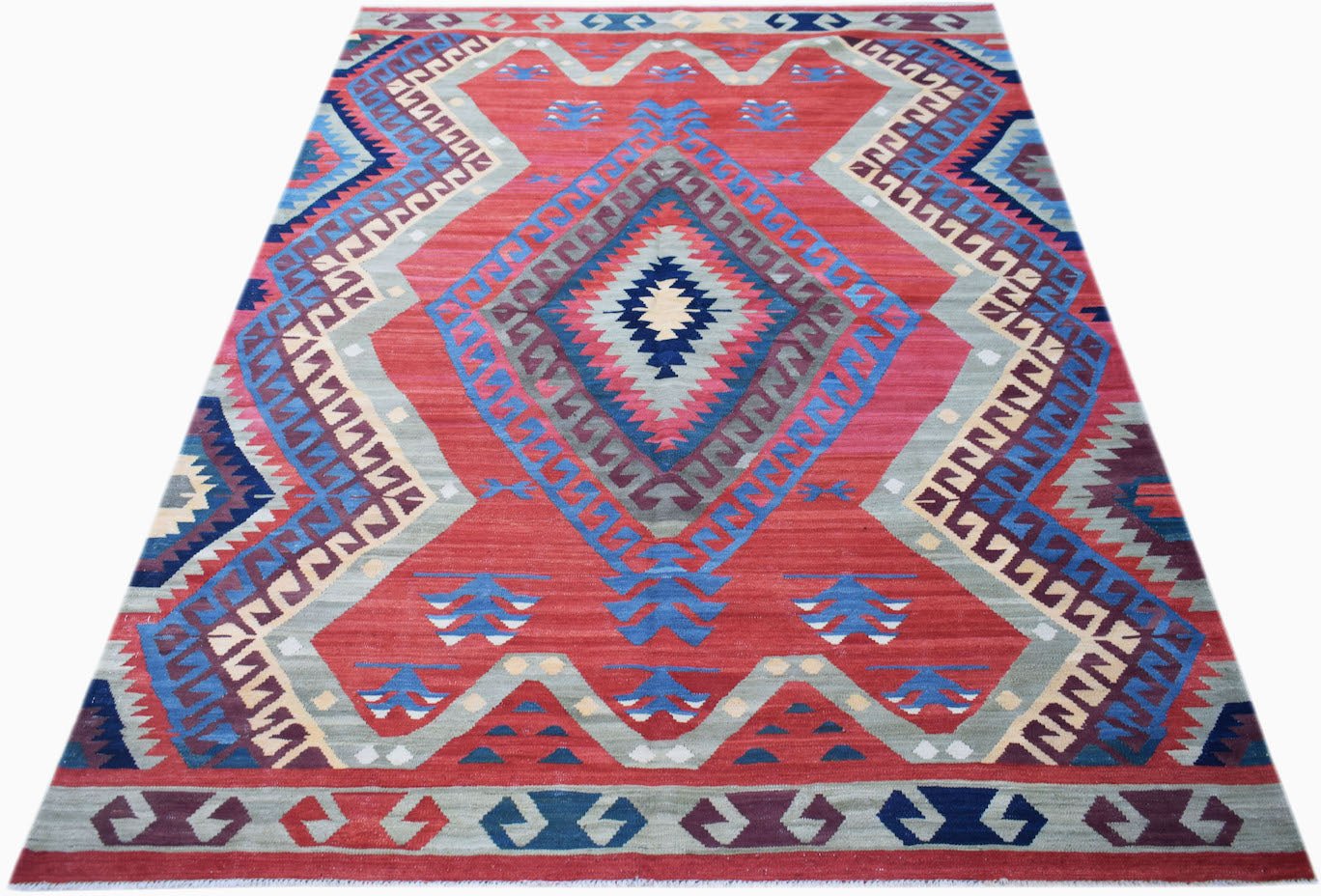Handmade Afghan Mazari Sharif kilim featuring a red field with geometric diamond patterns.