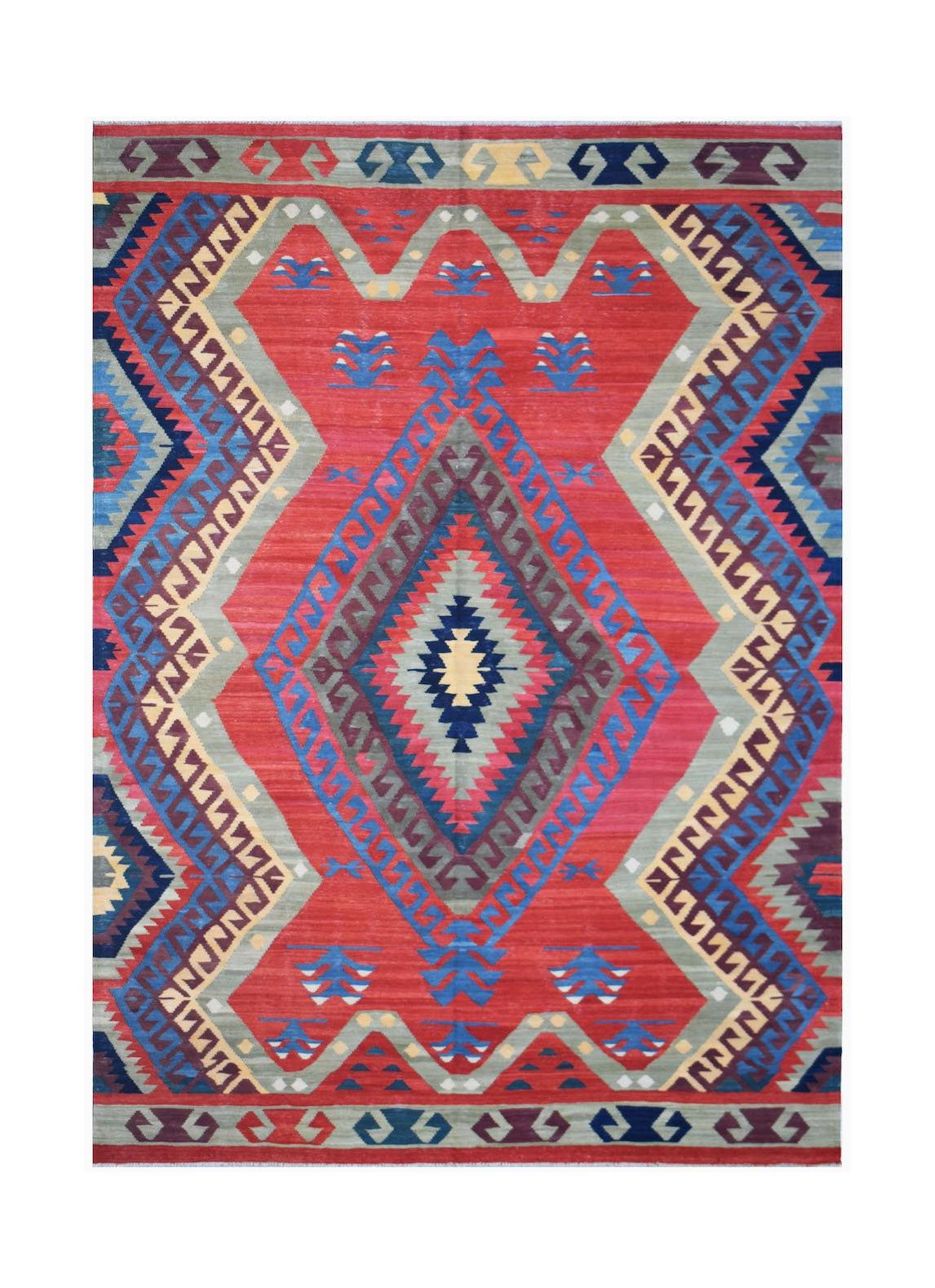 Handwoven Afghan Mazari Sharif kilim featuring a vibrant red field with geometric diamond patterns.