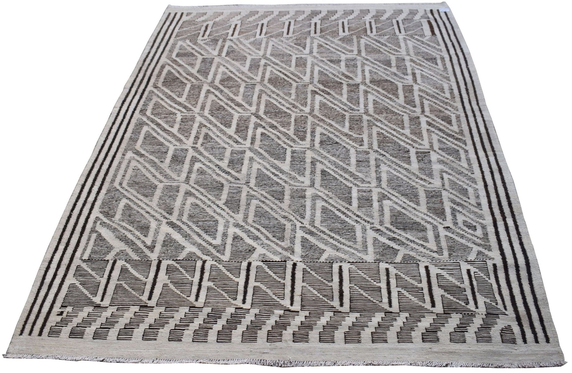 Handmade Afghan Maimana kilim rug featuring a geometric pattern in shades of brown and cream.