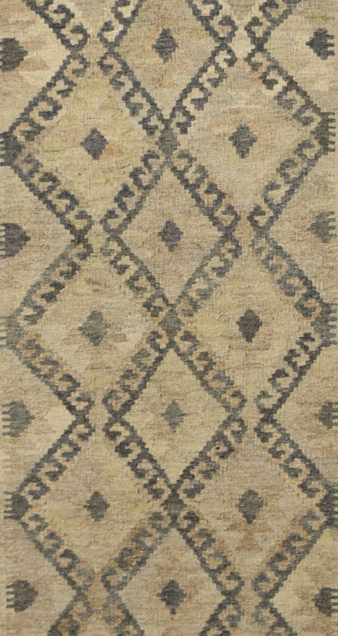 Handmade Afghan Maimana kilim rug featuring a geometric diamond pattern in natural wool tones.