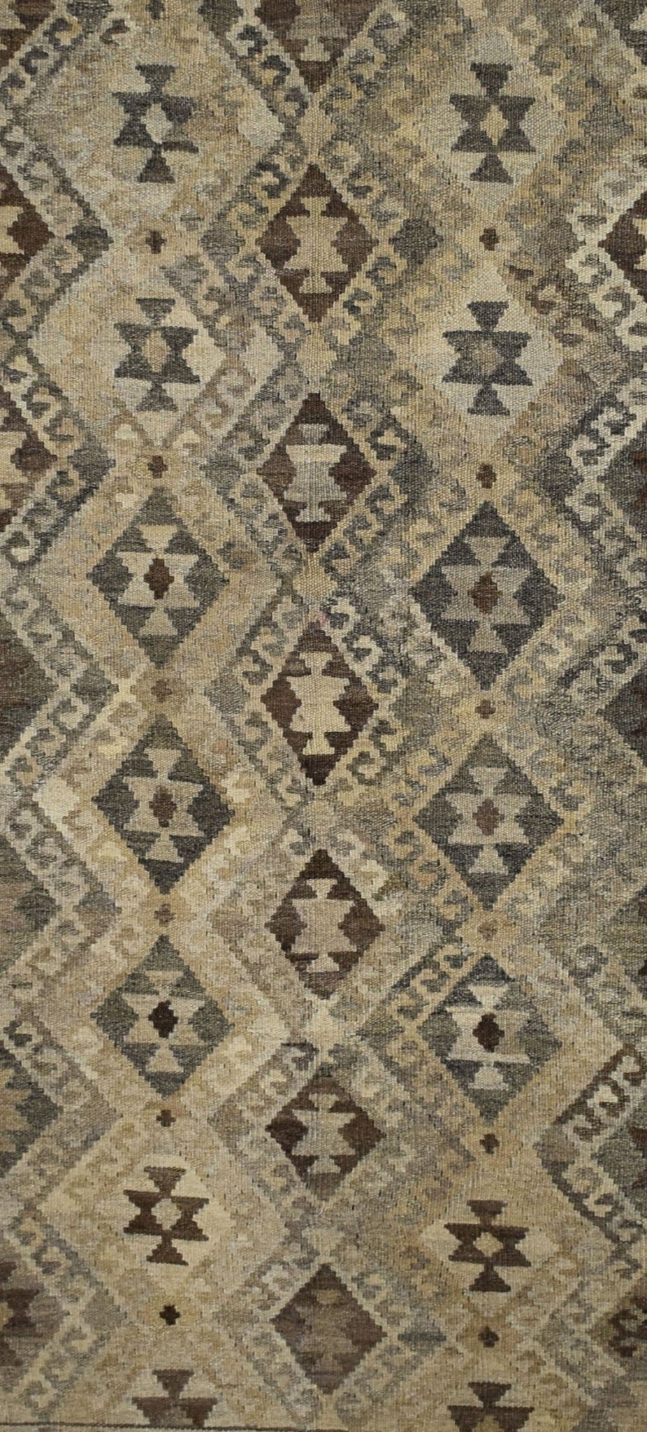 Handmade Afghan Maimana kilim rug featuring a geometric diamond pattern in natural wool tones.