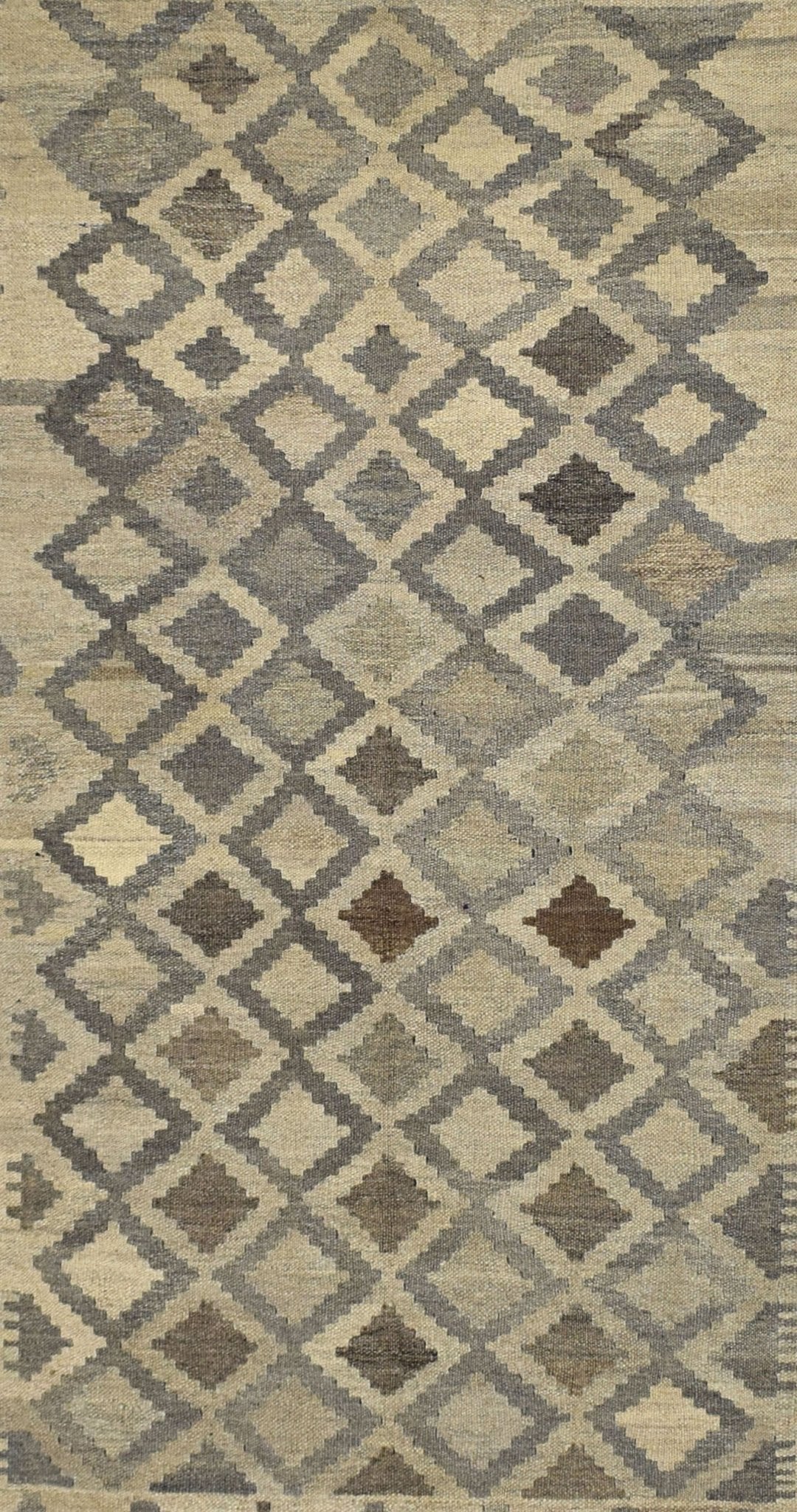 Handmade Afghan Maimana kilim rug featuring a repeating geometric diamond pattern in natural wool.