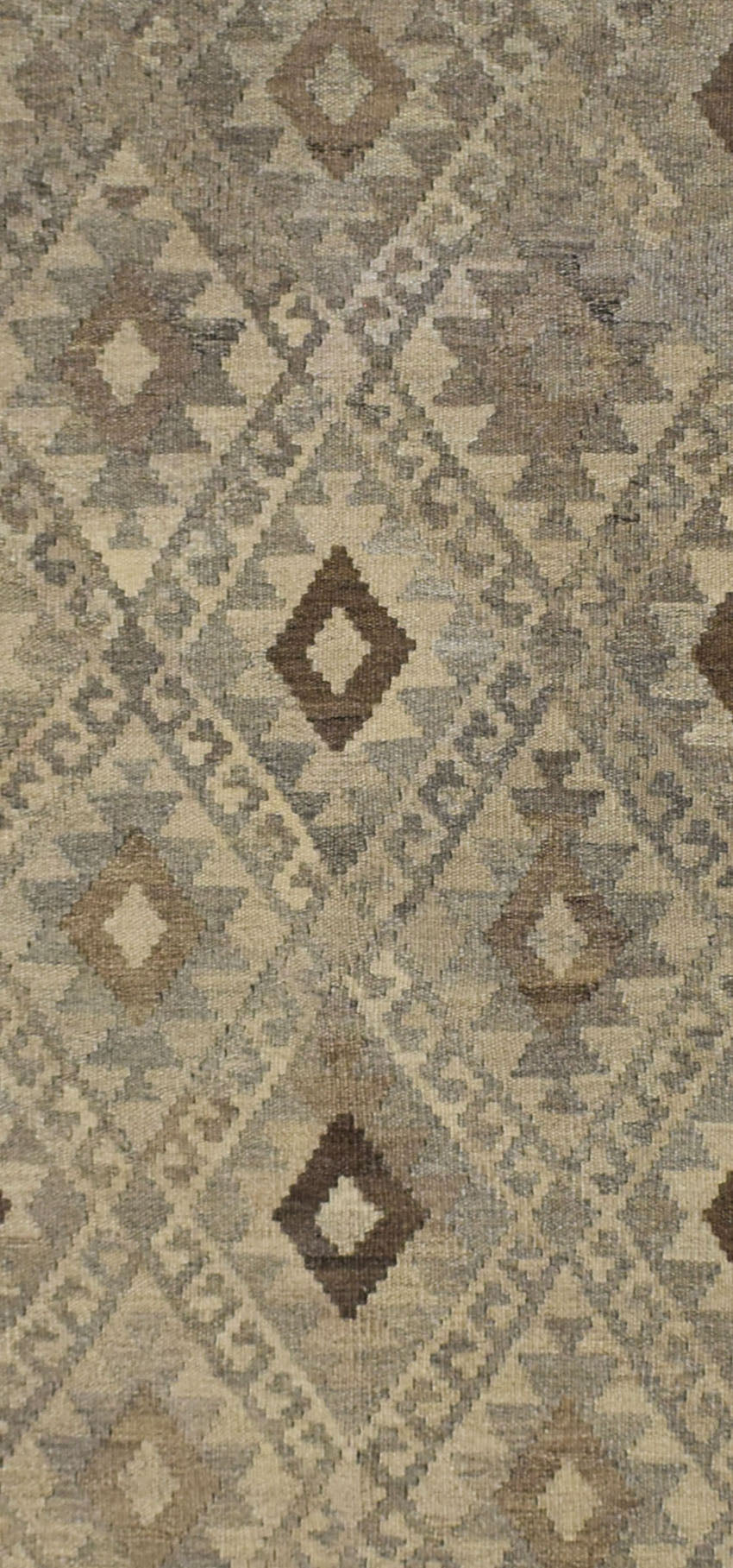 Handmade Afghan Maiamana kilim rug featuring a geometric diamond pattern in natural wool tones.