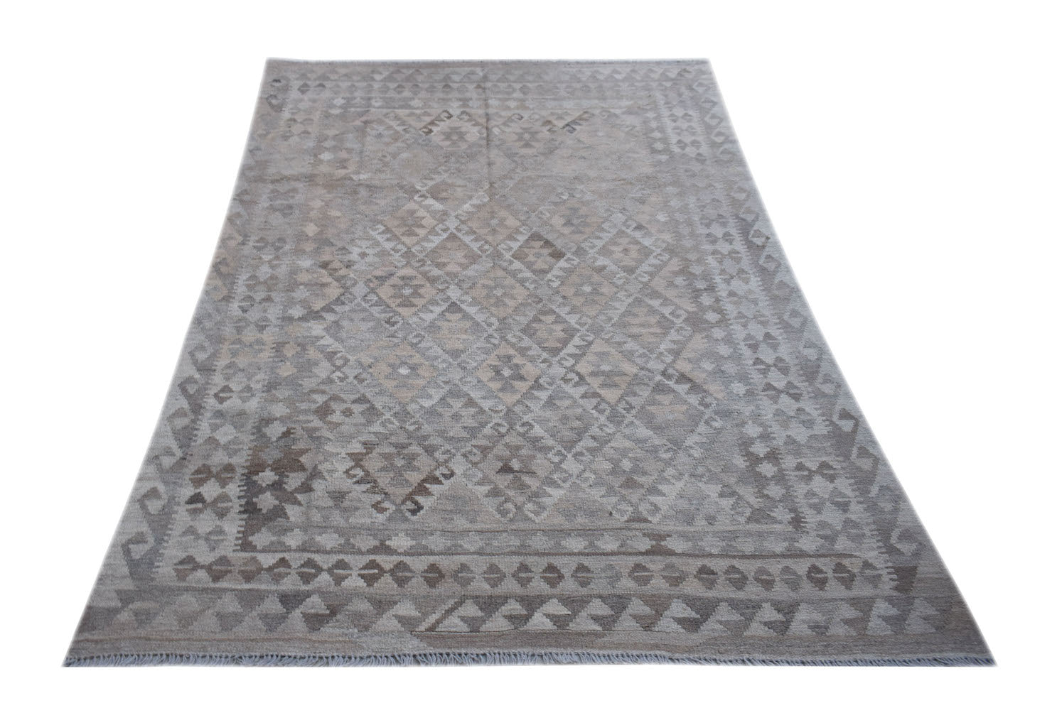Handwoven Afghan Maimana kilim rug featuring a neutral geometric pattern in undyed natural wool.