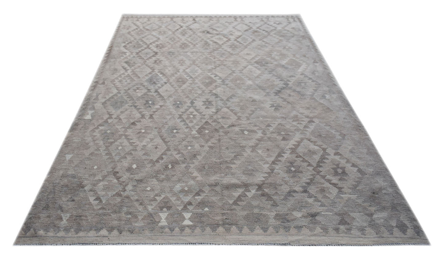 Handwoven Afghan Maimana kilim rug featuring a neutral geometric pattern in undyed natural wool.