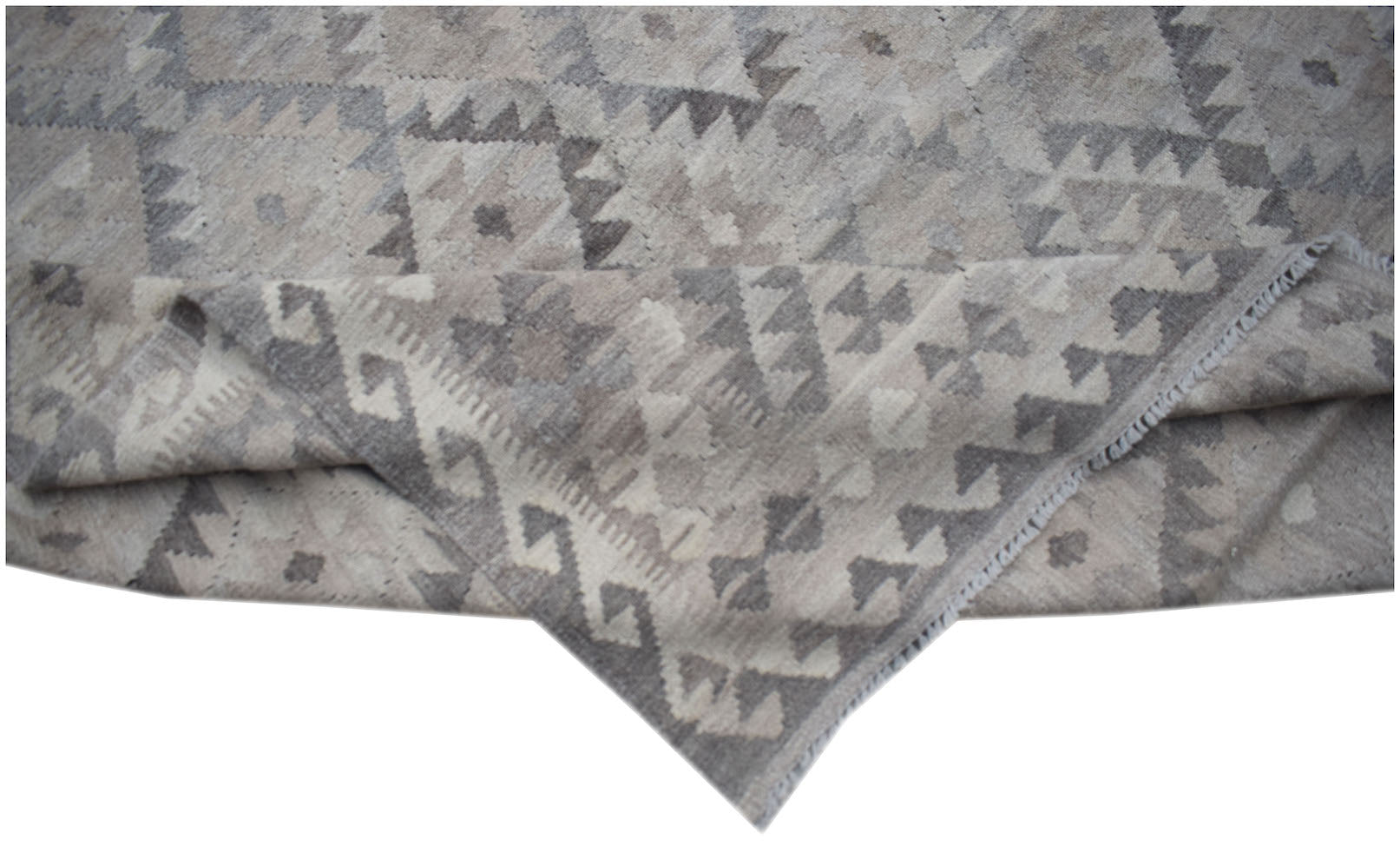 Handwoven Afghan Maiamana kilim featuring a neutral grey geometric pattern in natural wool.