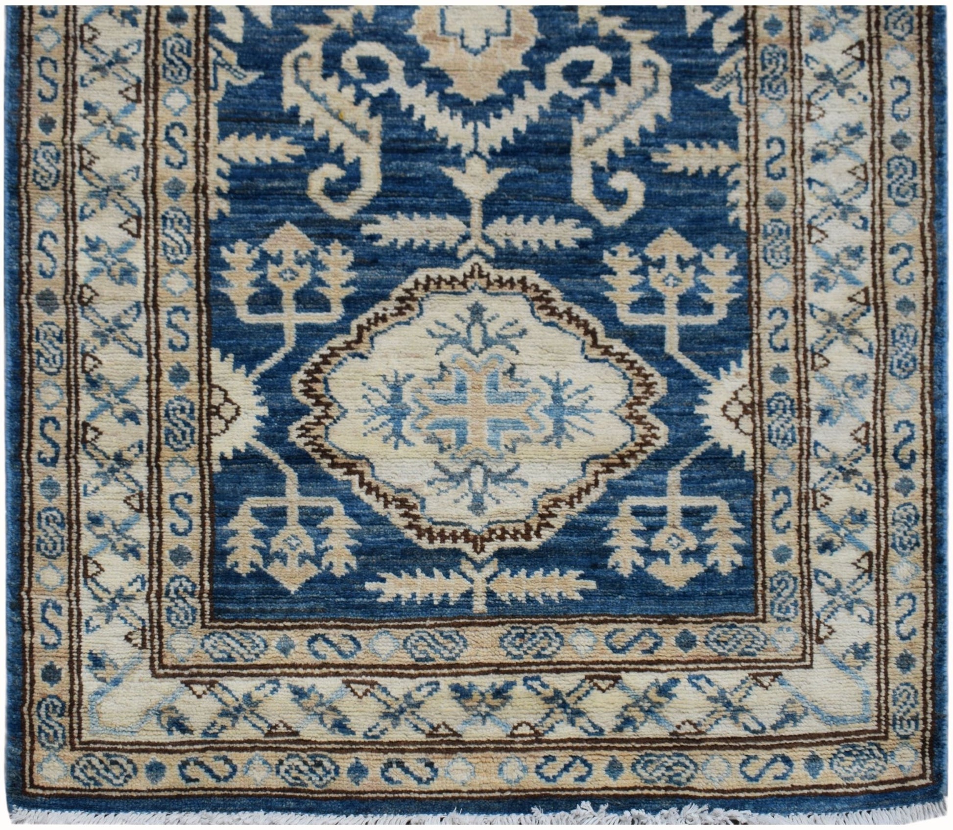An Afghan Super Kazakh runner rug featuring traditional geometric motifs in blue and cream wool.
