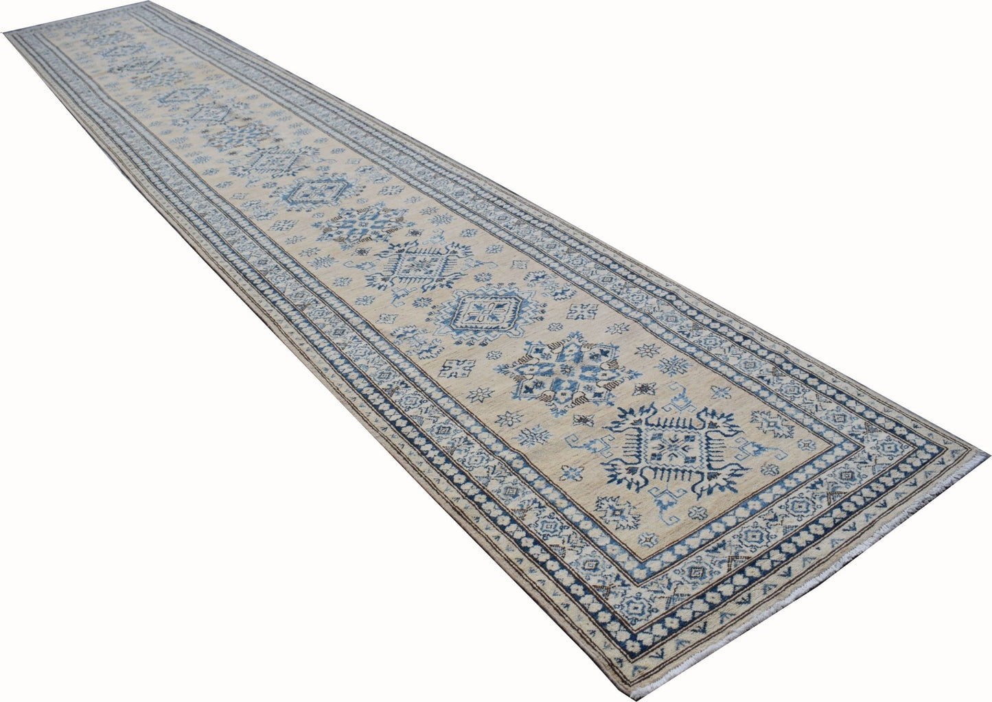 An Afghan Super Kazakh runner rug featuring traditional blue geometric motifs on a beige field.