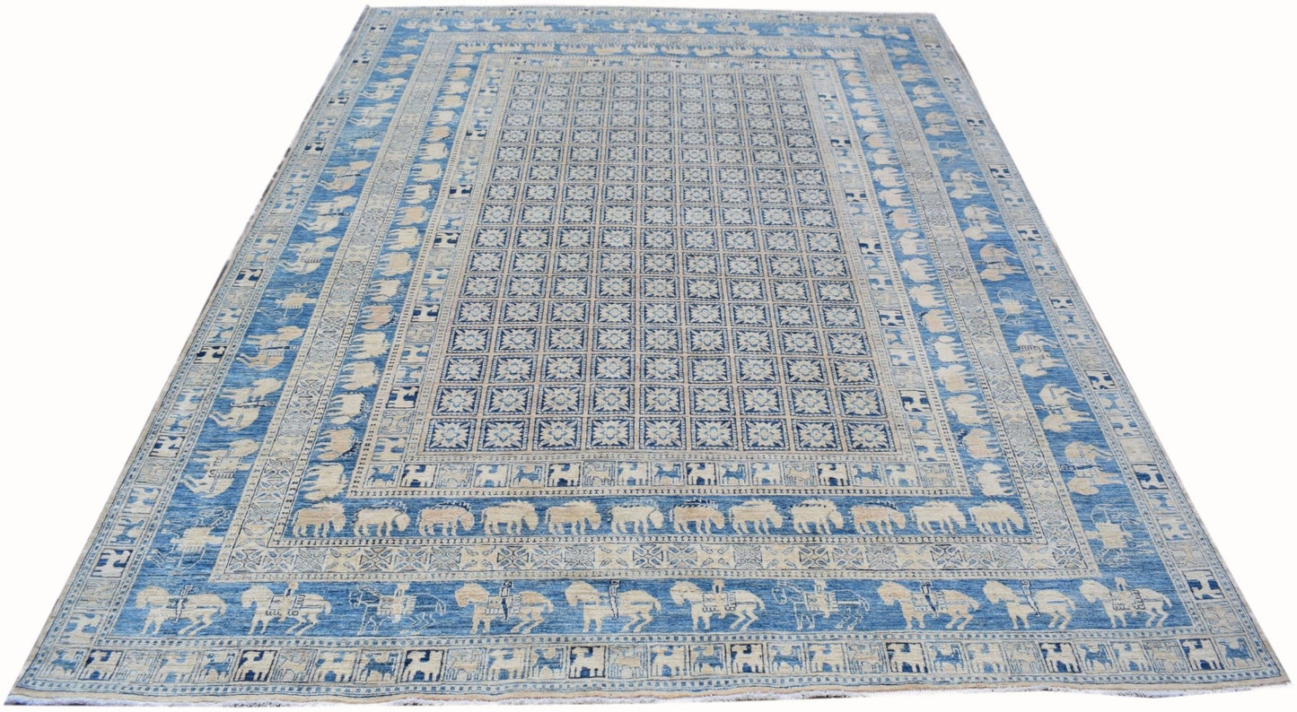 An Afghan Chobi rug featuring a blue field with a grid of floral motifs and animal border patterns.