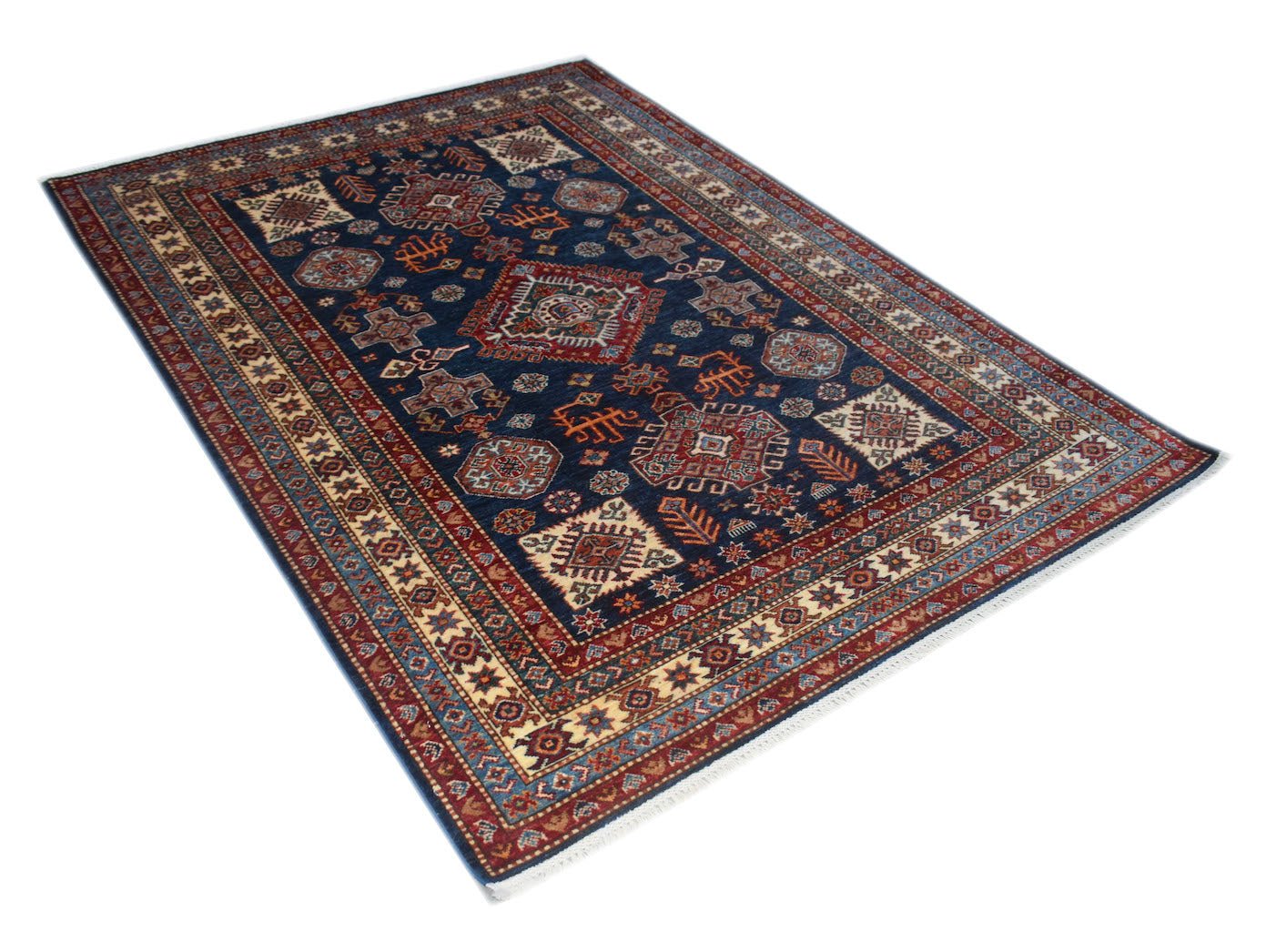 A handmade Afghan Super Kazakh rug featuring traditional geometric motifs in blue, red, and cream.
